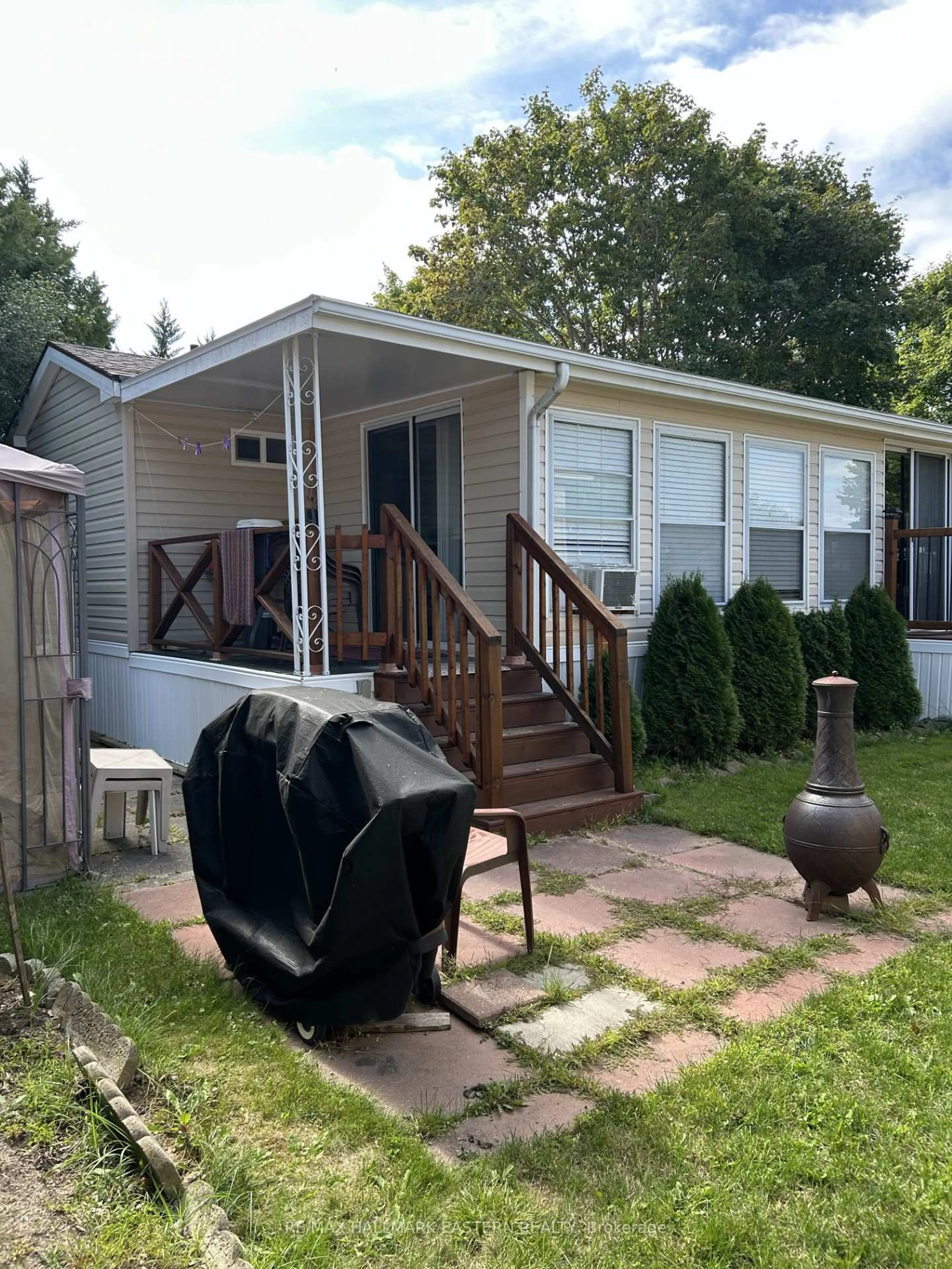 Home with vinyl exterior material, street for 7 Hilltop Dr, Otonabee-South Monaghan Ontario K0L 2G0