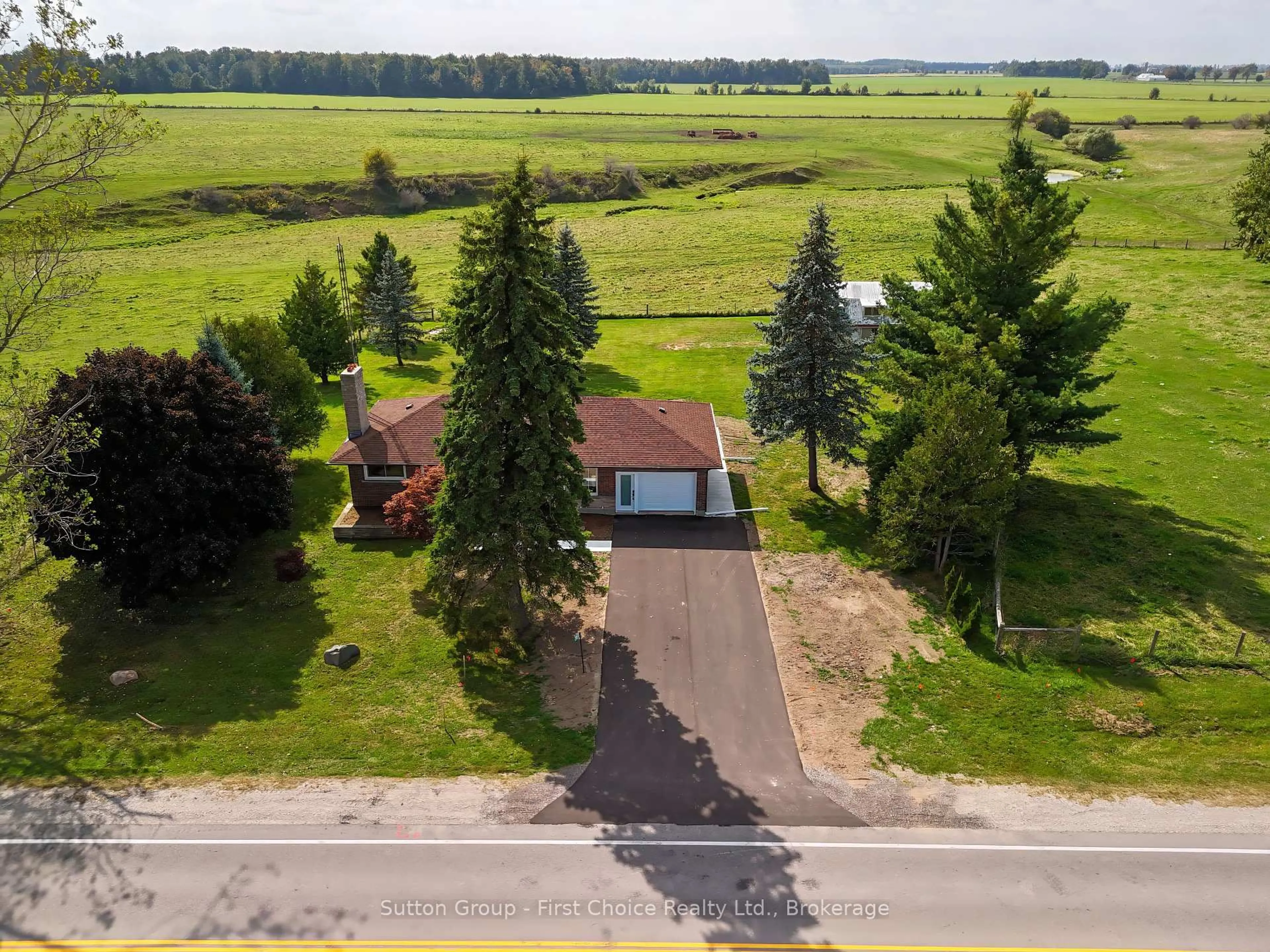 A pic from outside/outdoor area/front of a property/back of a property/a pic from drone, street for 3552 ROAD 112, Perth East Ontario N5A 6S3