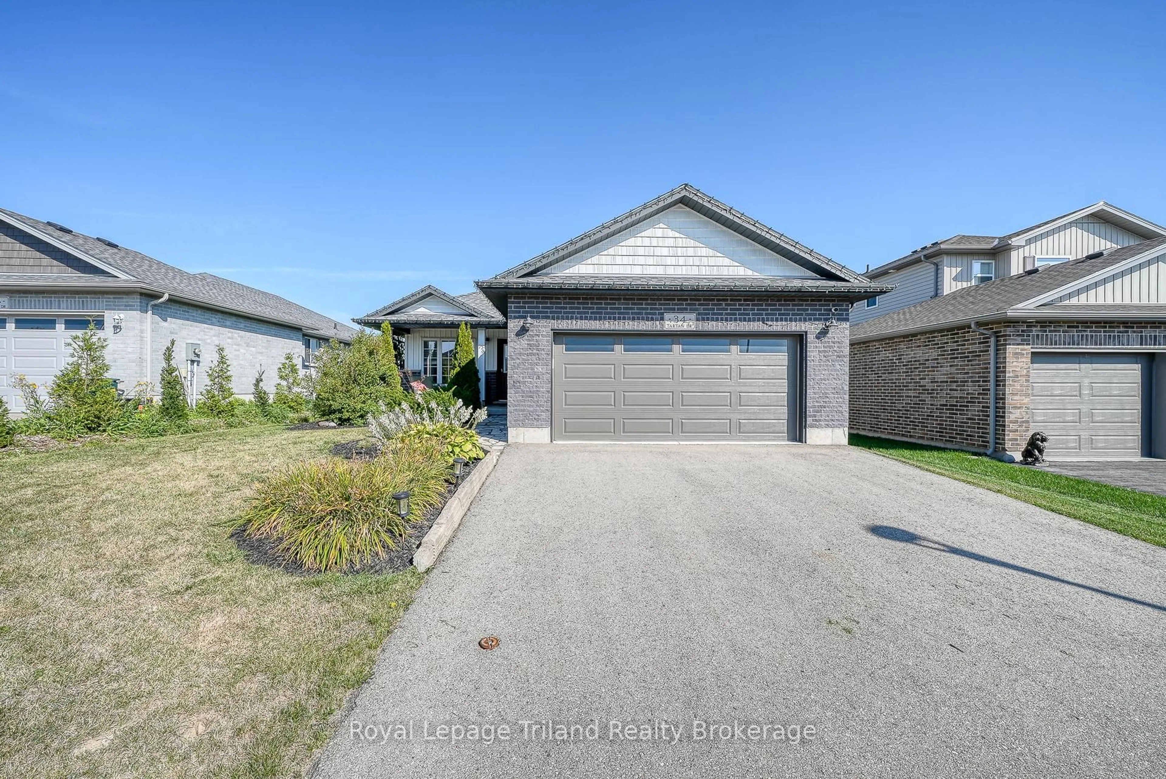 A pic from outside/outdoor area/front of a property/back of a property/a pic from drone, street for 34 Tartan Dr, Zorra Ontario N0J 1J0