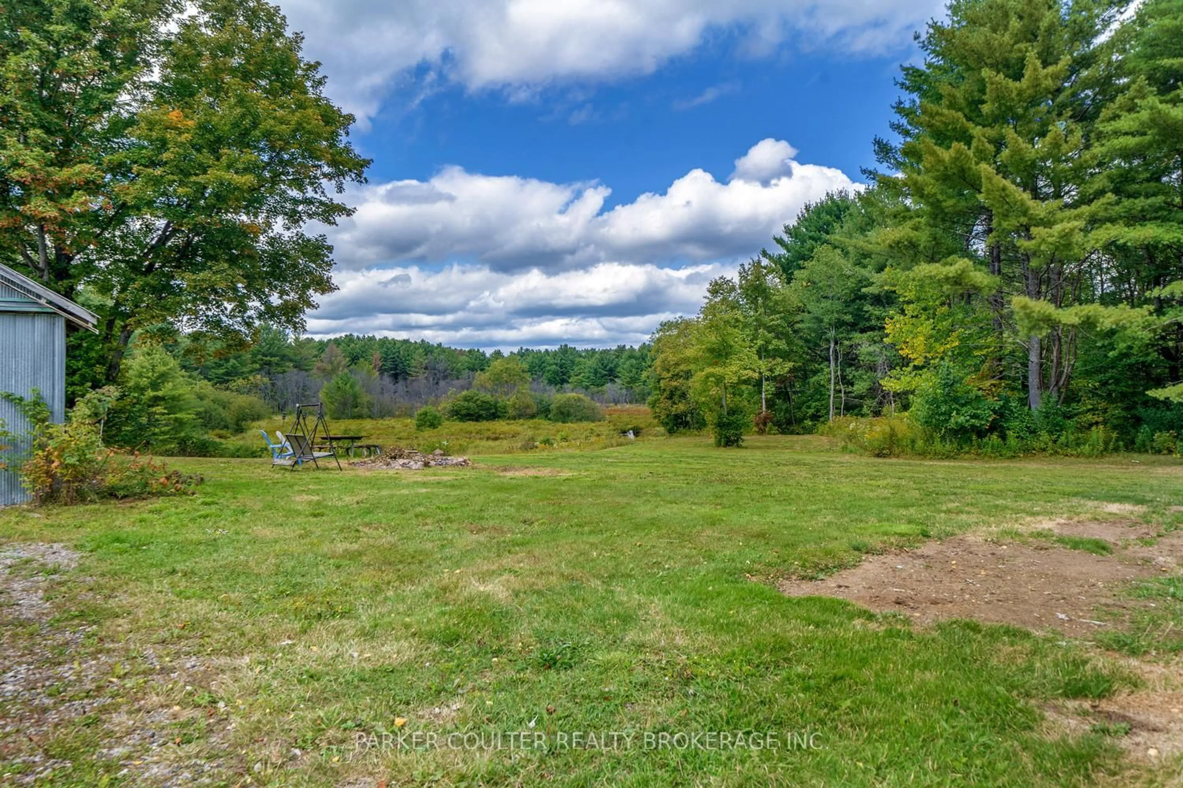 A pic from outside/outdoor area/front of a property/back of a property/a pic from drone, forest/trees view for 259 Nippissing Rd, Seguin Ontario P0C 1J0