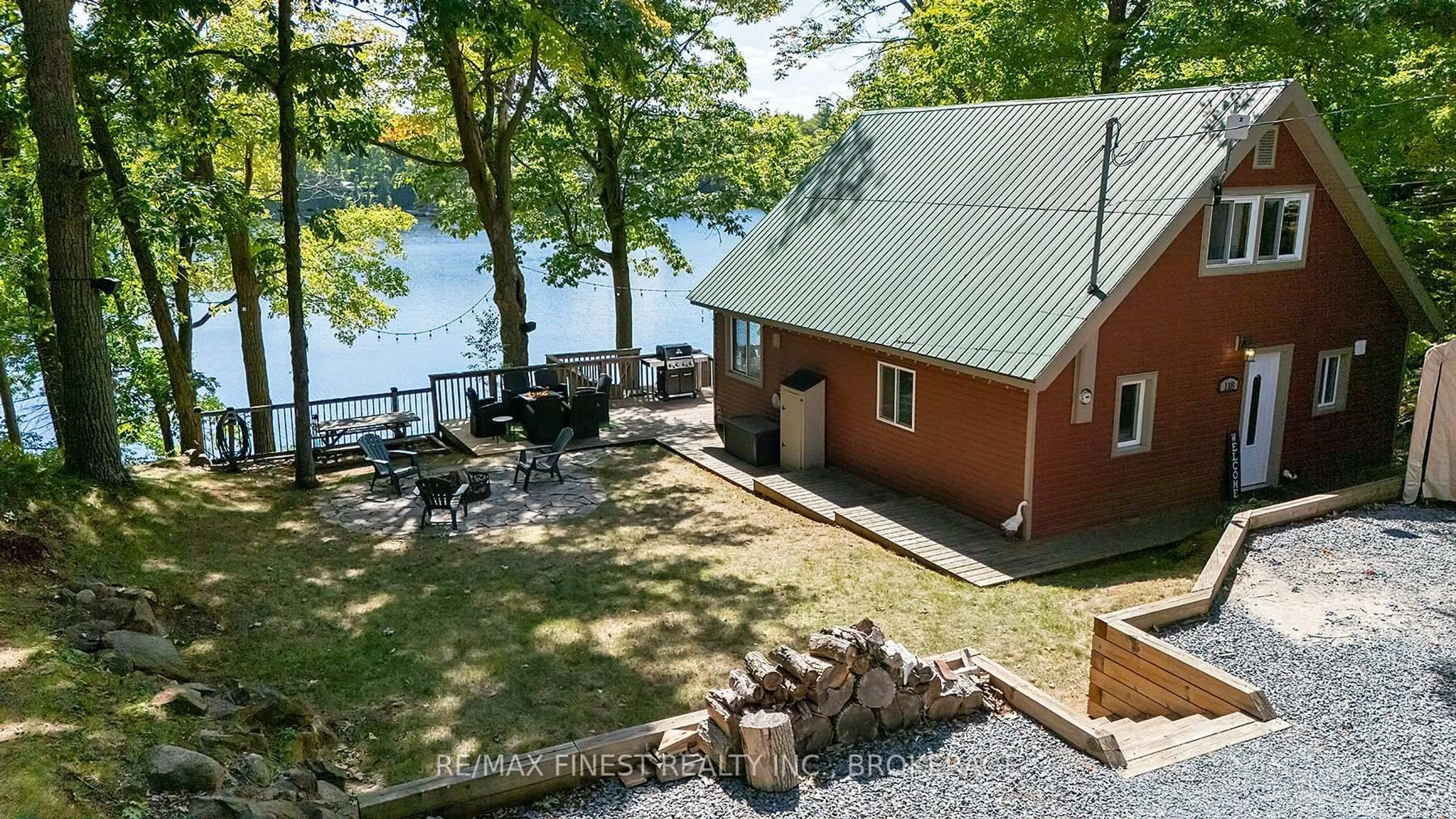 A pic from outside/outdoor area/front of a property/back of a property/a pic from drone, water/lake/river/ocean view for 118 Pero Lane, Hartington Ontario K0H 1W0