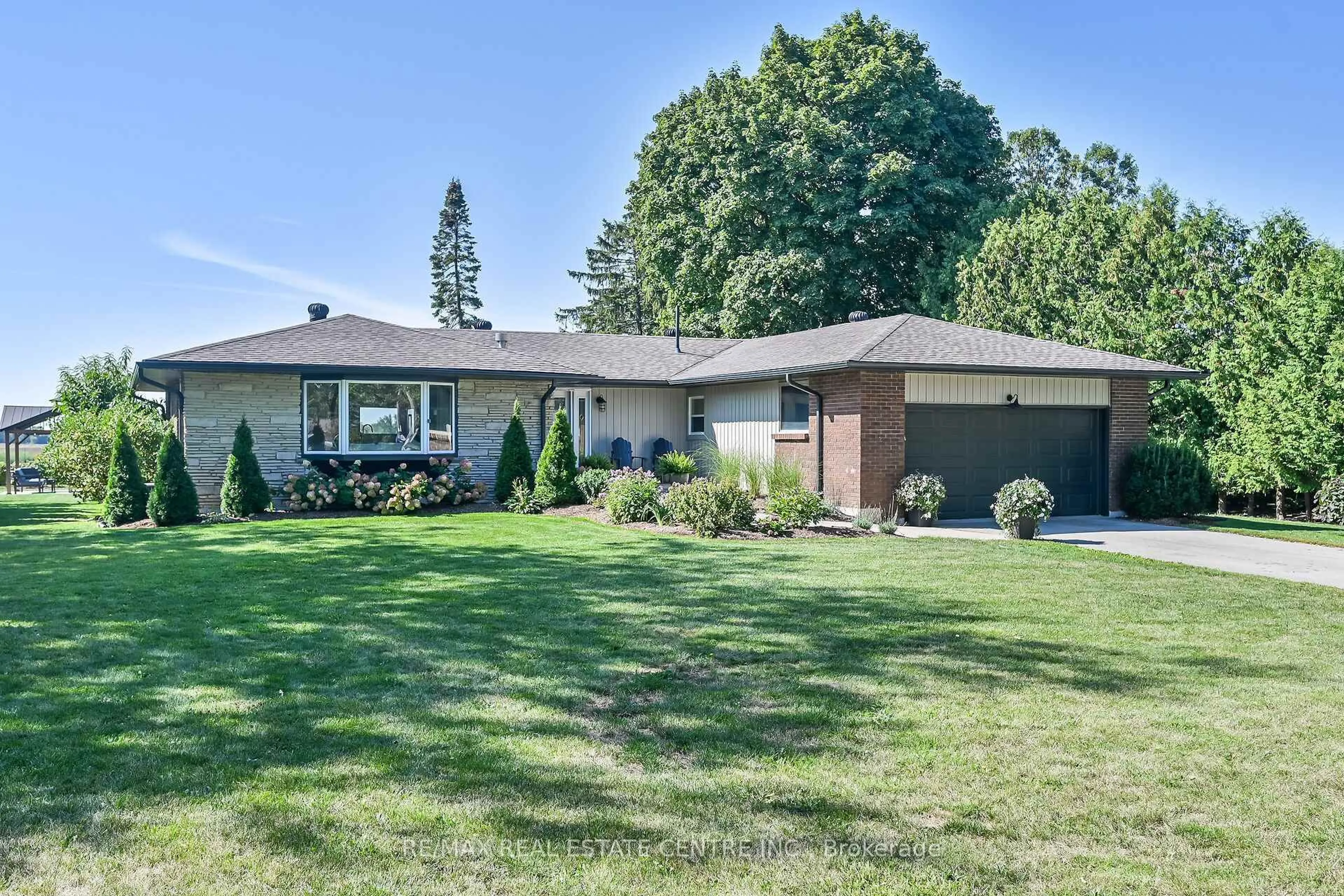 Home with brick exterior material, street for 2121 Golf Club Rd, Hamilton Ontario L0R 1P0