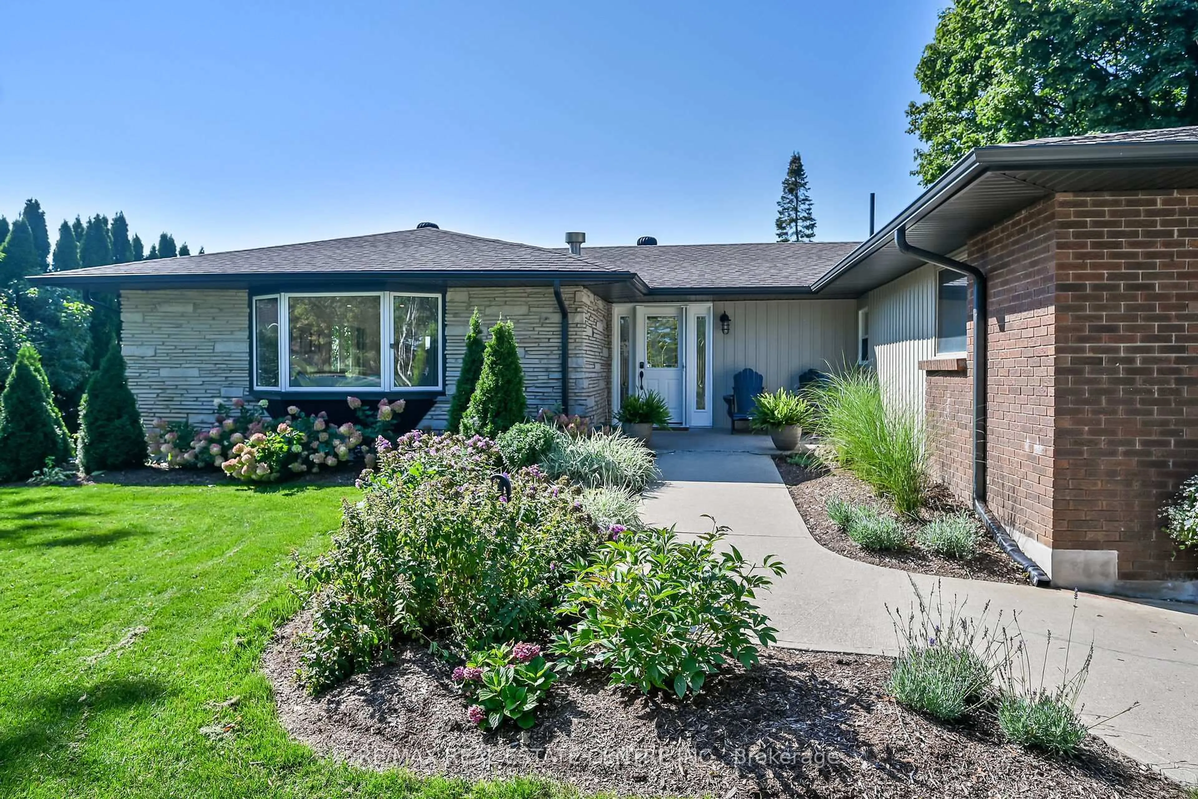 Home with brick exterior material, street for 2121 Golf Club Rd, Hamilton Ontario L0R 1P0