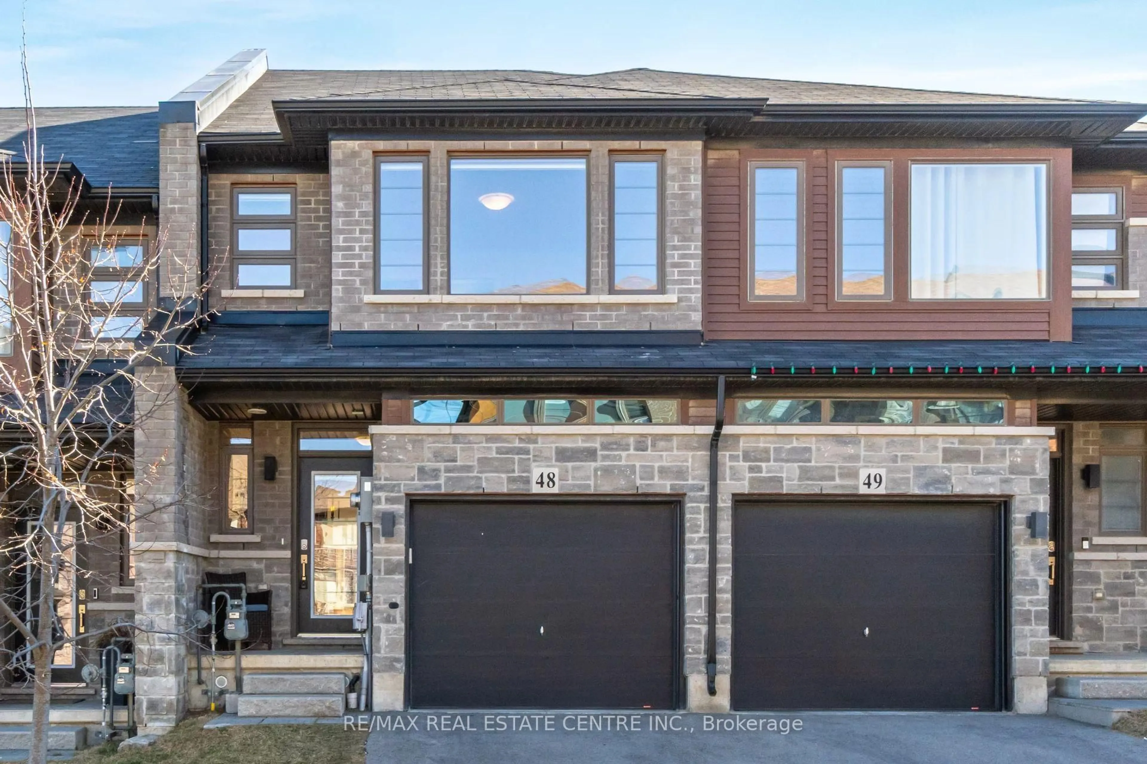Home with brick exterior material, street for 30 Times Square Blvd #48, Hamilton Ontario L8J 0L8