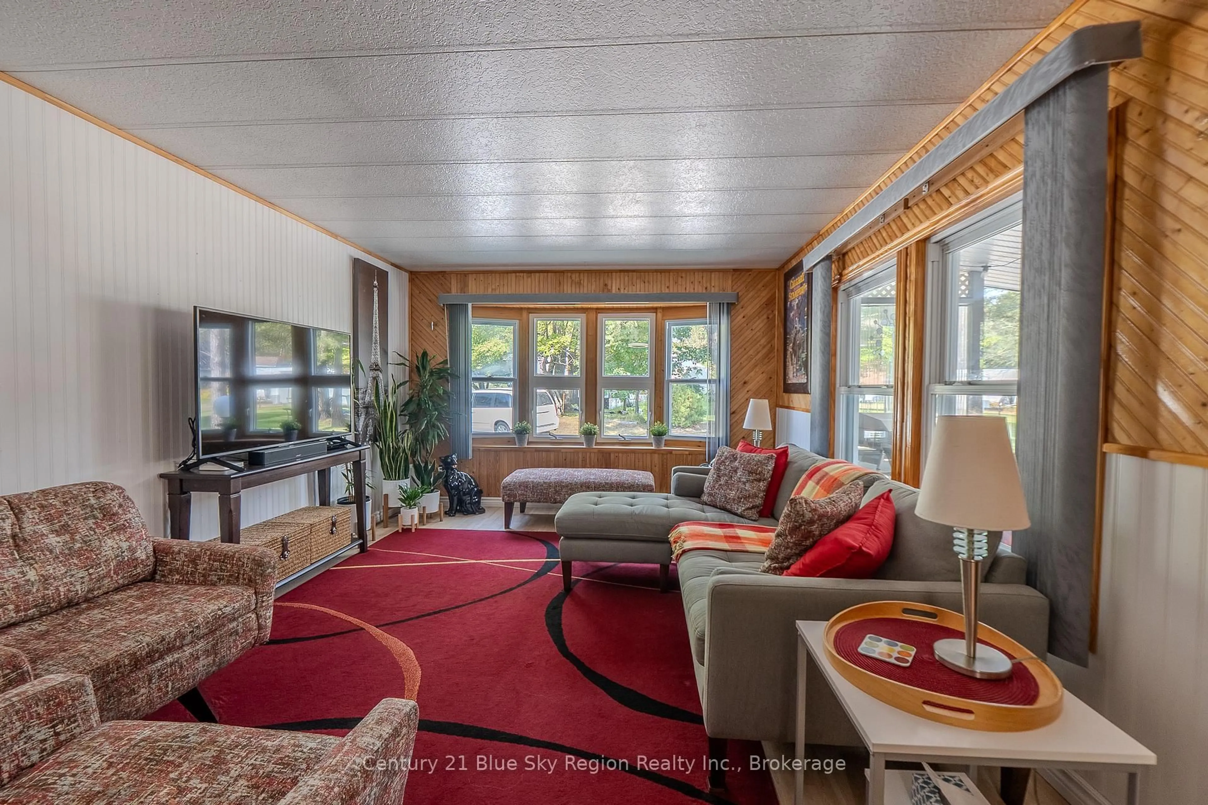 Living room with furniture, unknown for 208 Little Down Lane #12, North Bay Ontario P1B 8G2