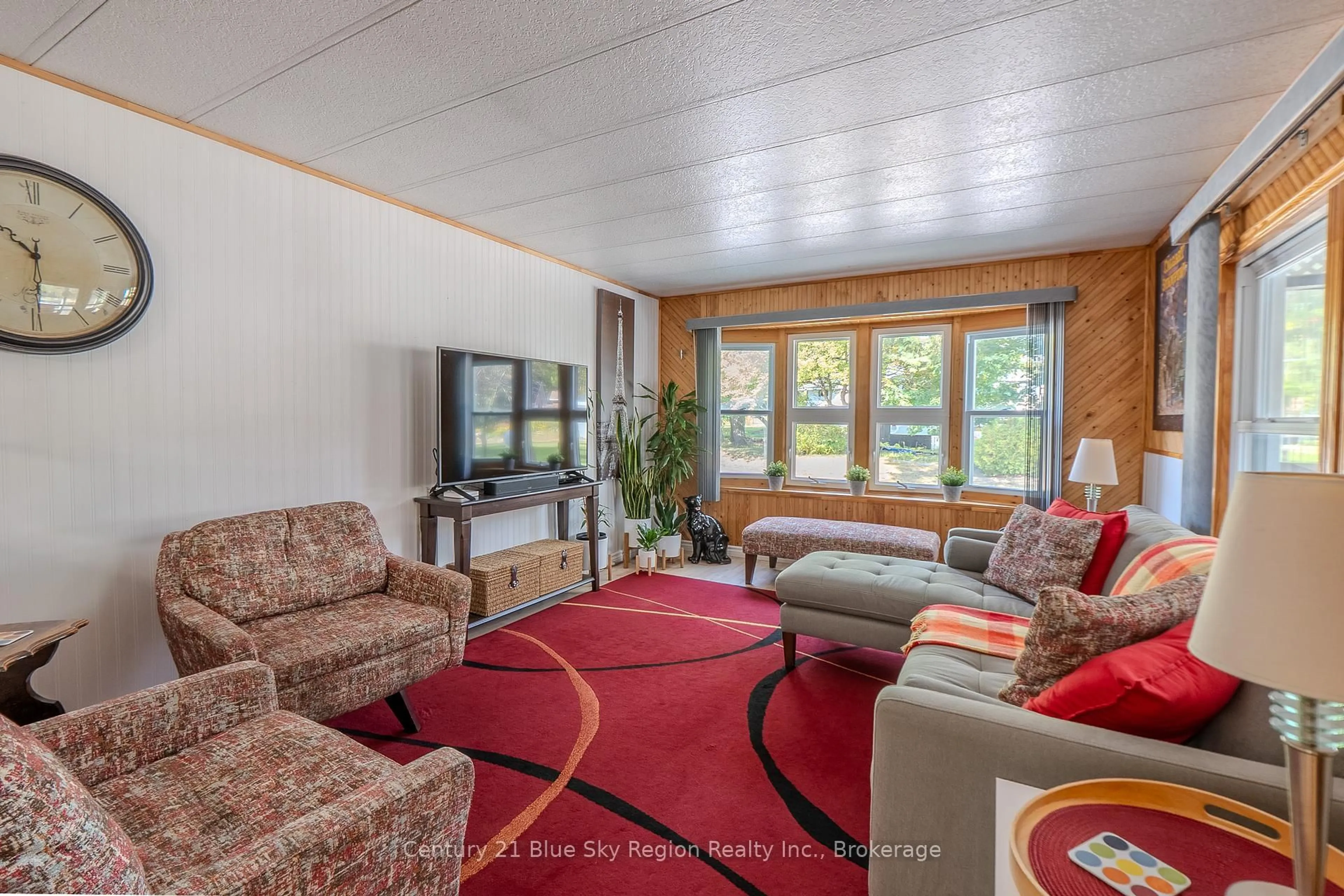 Living room with furniture, unknown for 208 Little Down Lane #12, North Bay Ontario P1B 8G2
