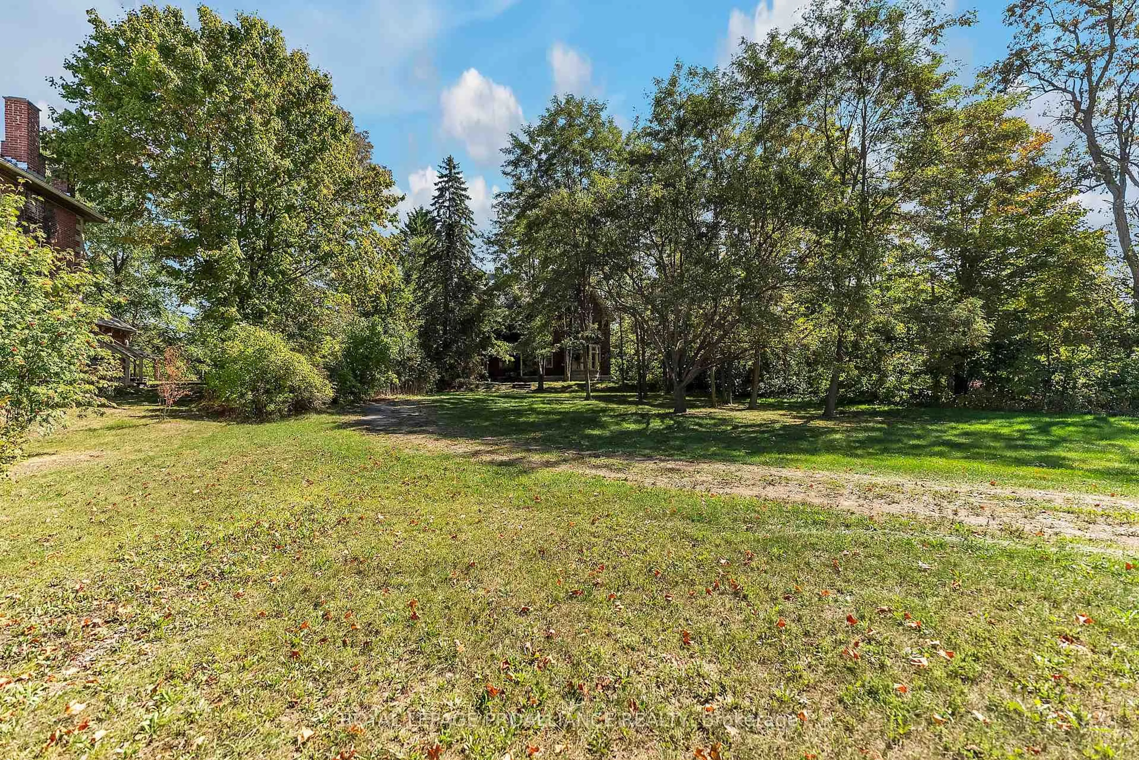 A pic from outside/outdoor area/front of a property/back of a property/a pic from drone, forest/trees view for 187 Durham St, Madoc Ontario K0K 2K0