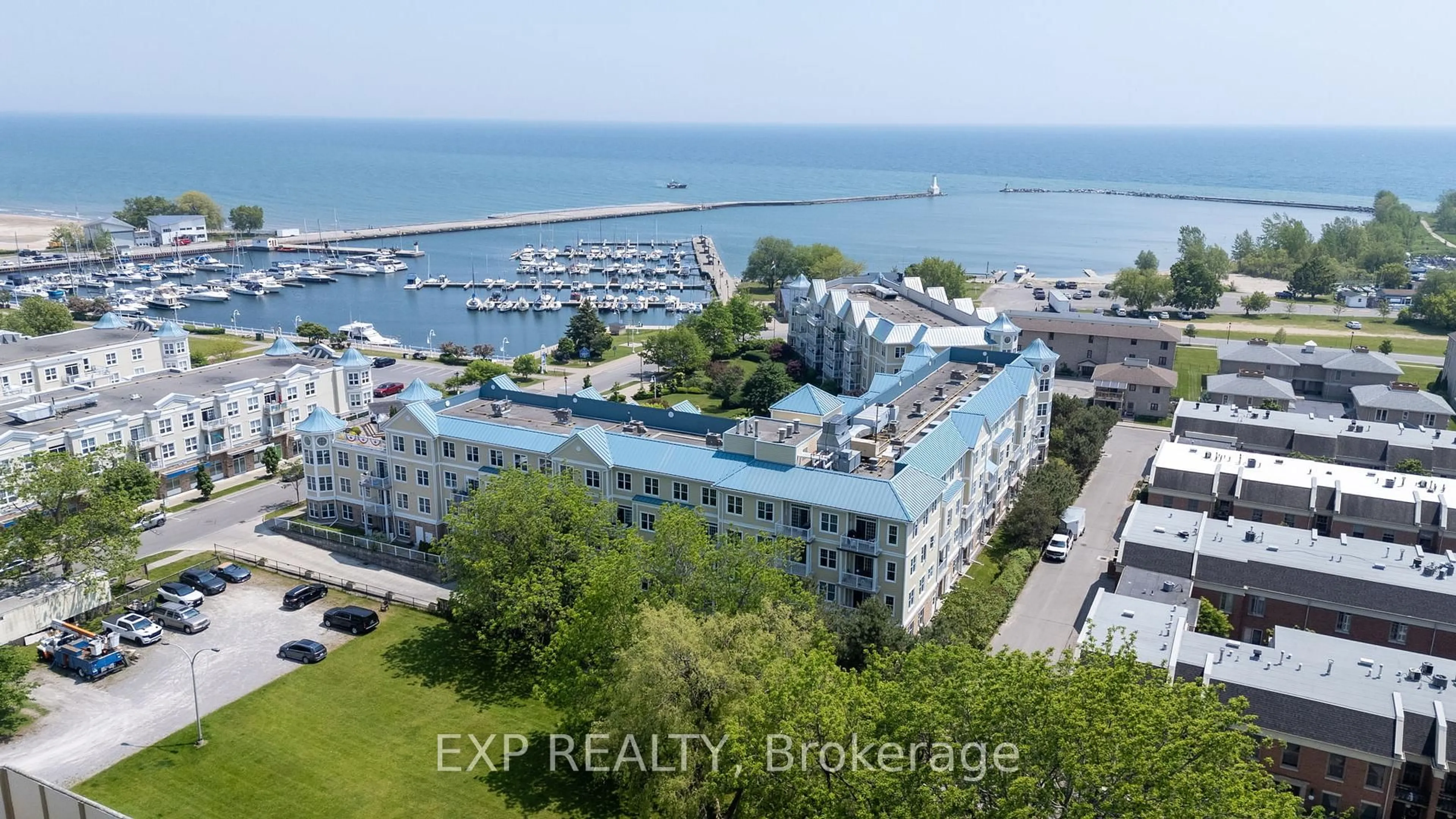 A pic from outside/outdoor area/front of a property/back of a property/a pic from drone, water/lake/river/ocean view for 145 Third St #309, Cobourg Ontario K9A 5X1
