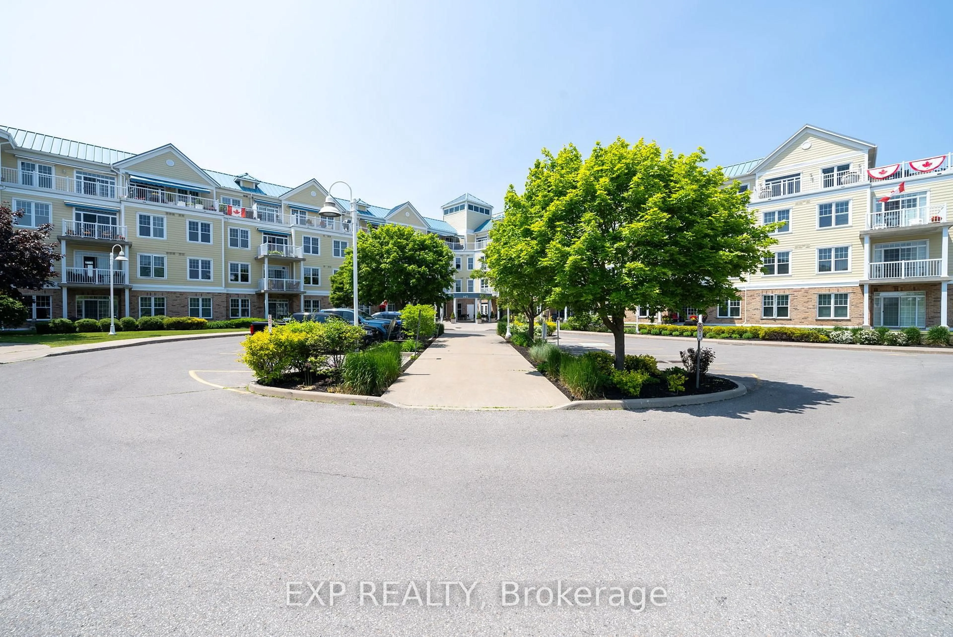 A pic from outside/outdoor area/front of a property/back of a property/a pic from drone, unknown for 145 Third St #309, Cobourg Ontario K9A 5X1