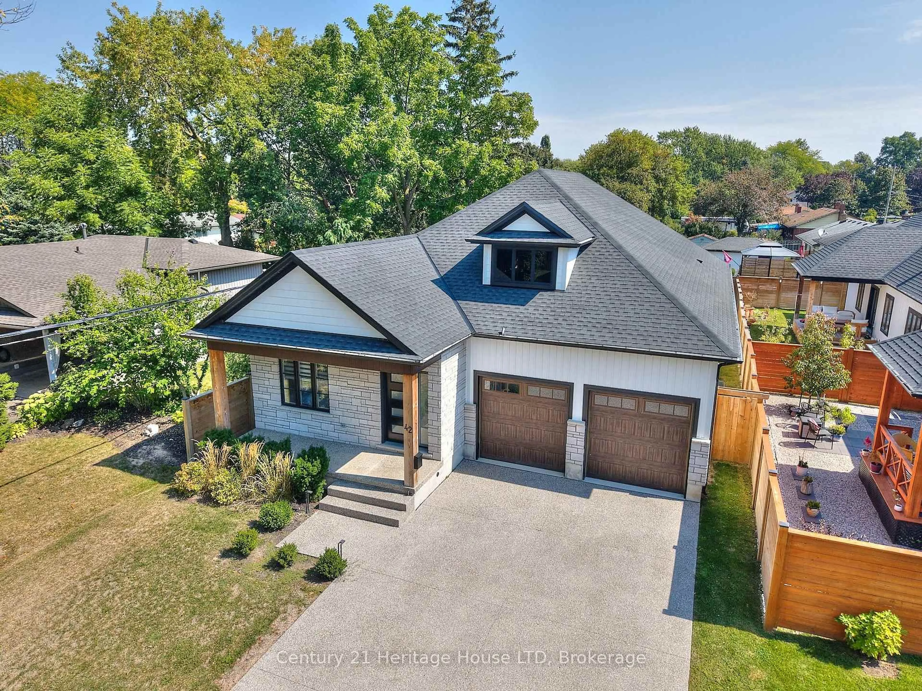 Home with brick exterior material, street for 42 Aquadale Dr, St. Catharines Ontario L2N 2P8