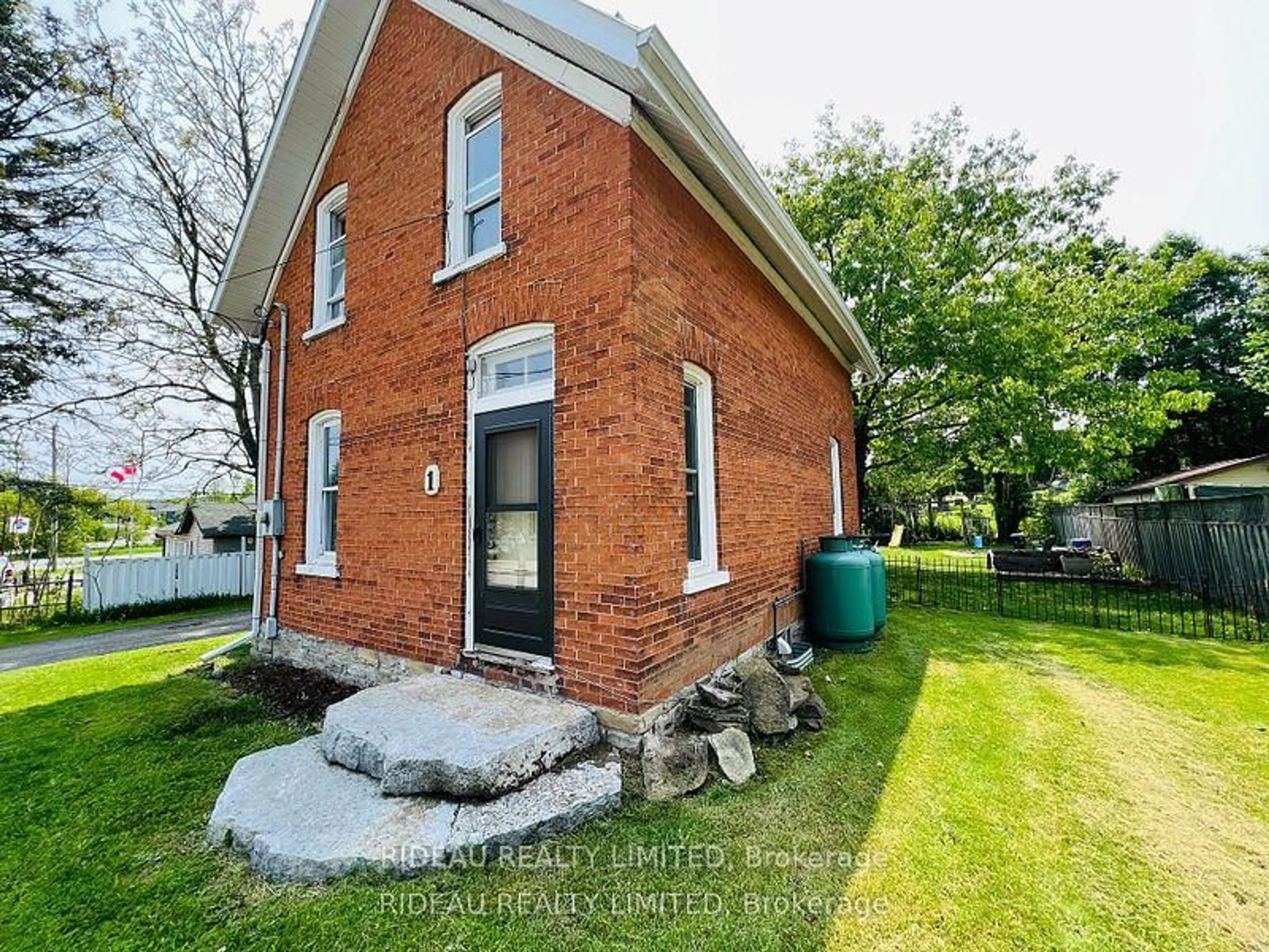Home with brick exterior material, street for 1 Mountain Rd, Westport Ontario K0G 1X0
