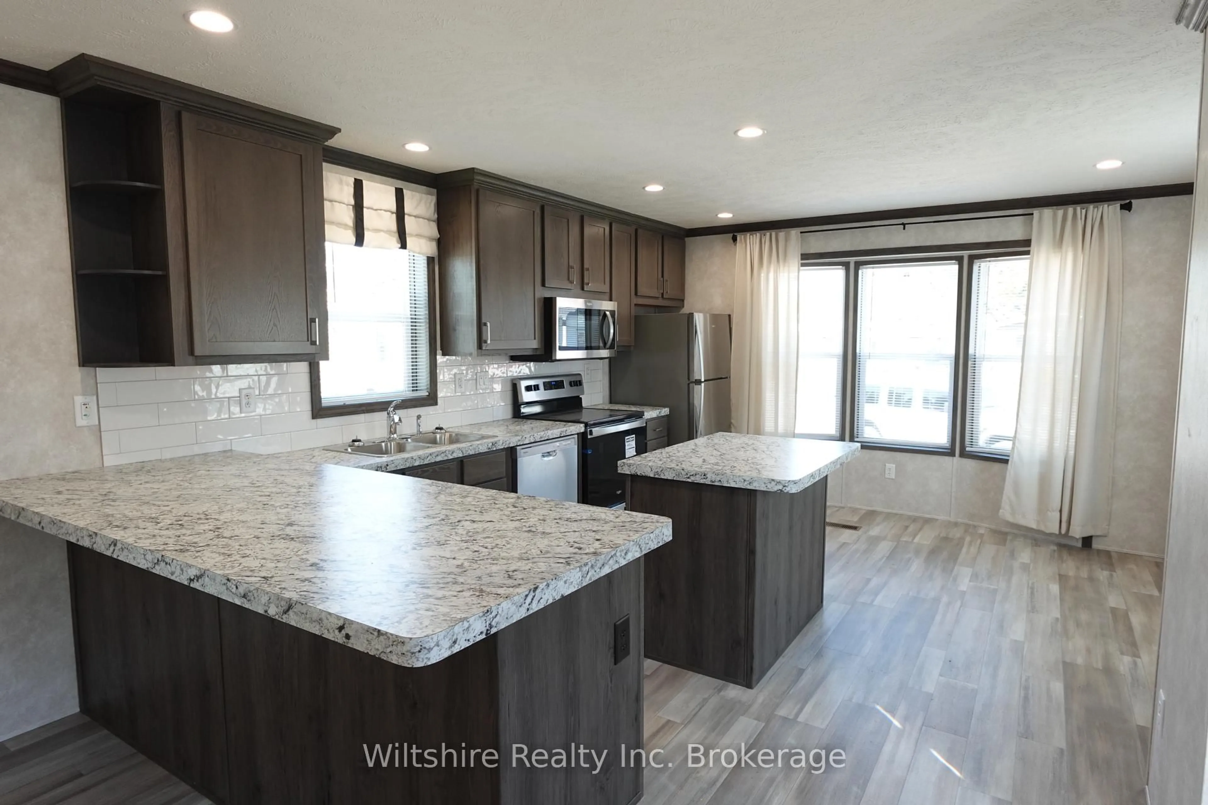Open concept kitchen, unknown for 11981 Plank Rd (tillsonburg) Rd #7, Bayham Ontario N4G 4G9