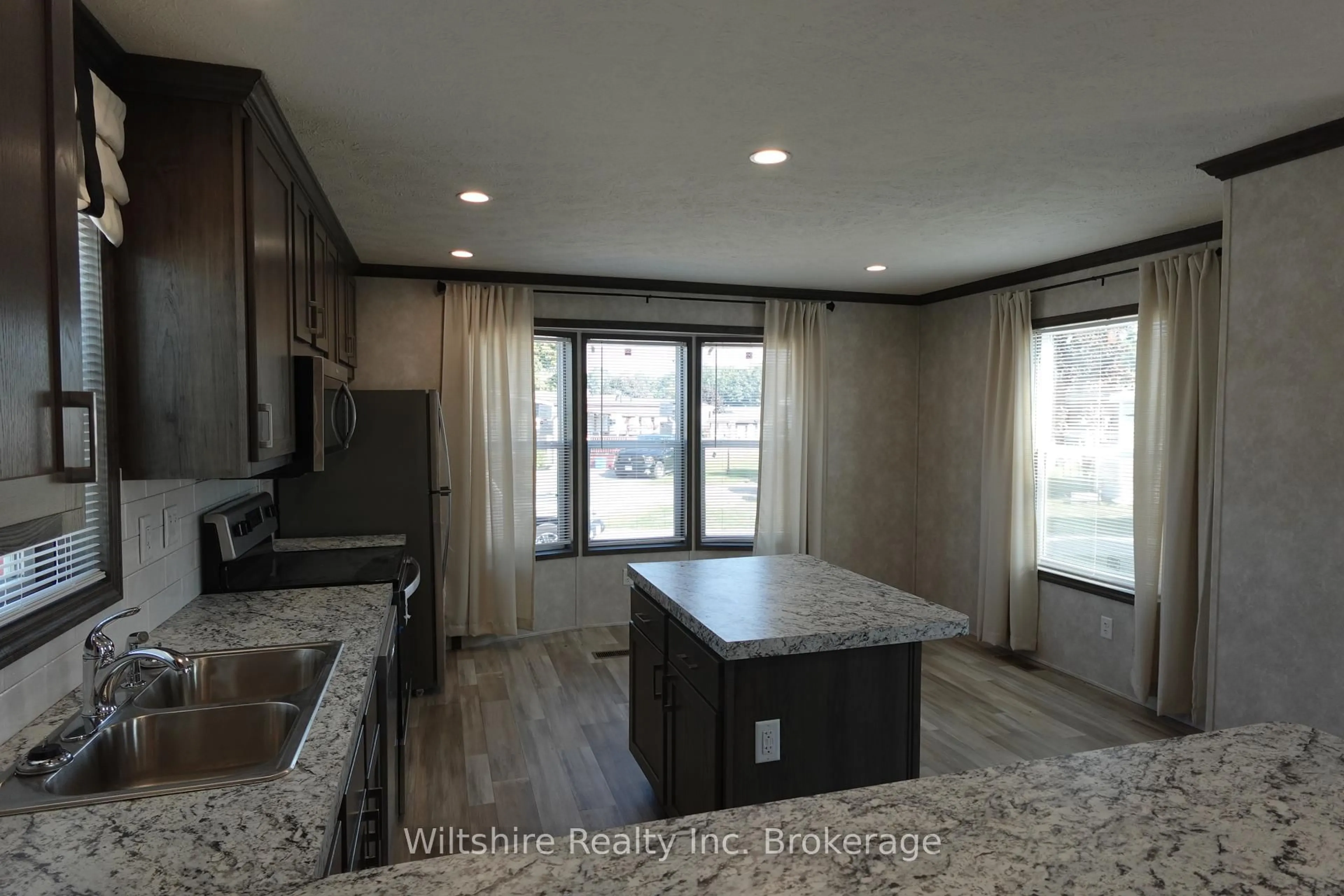 Open concept kitchen, unknown for 11981 Plank Rd (tillsonburg) Rd #7, Bayham Ontario N4G 4G9