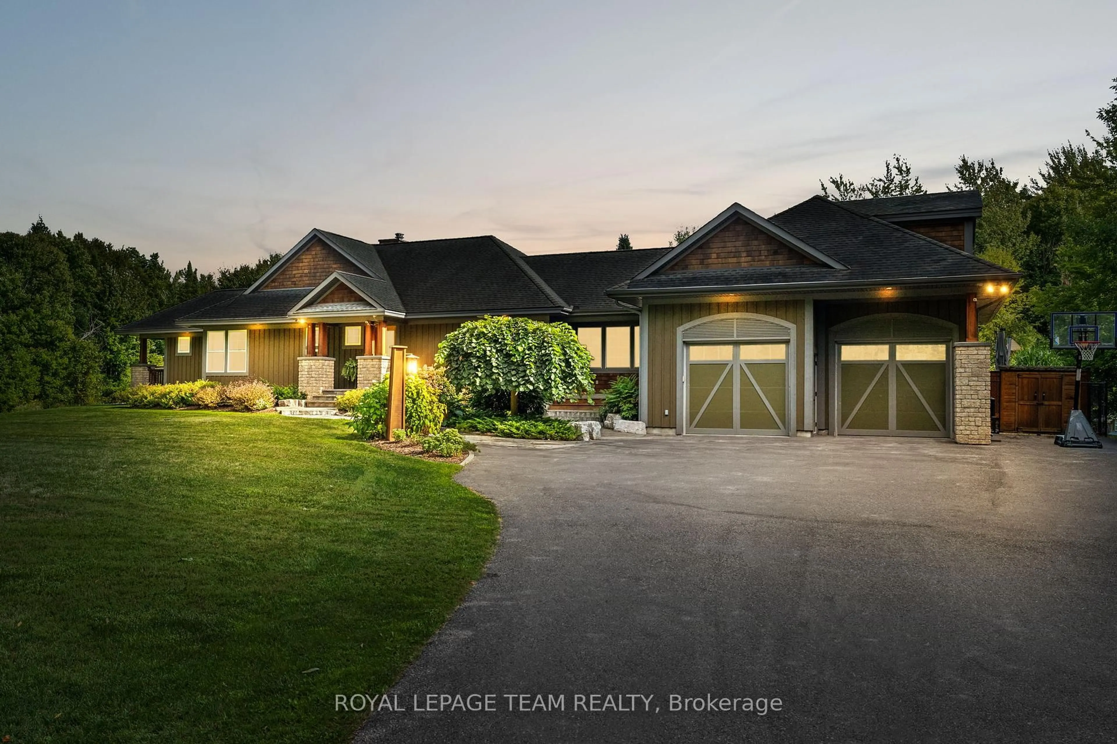 A pic from outside/outdoor area/front of a property/back of a property/a pic from drone, water/lake/river/ocean view for 1560 Maley Lane, Ottawa Ontario K2W 1C2