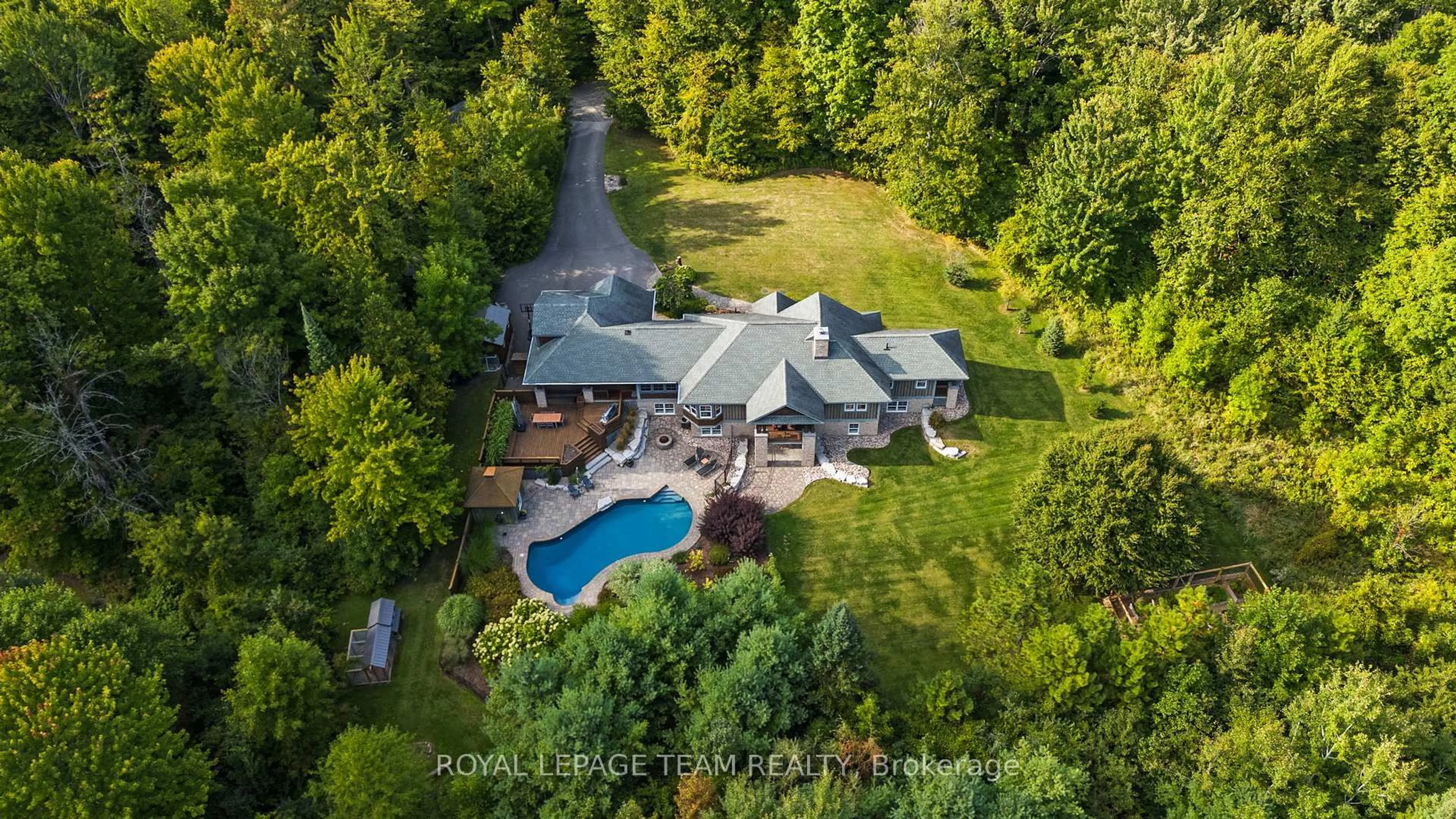 A pic from outside/outdoor area/front of a property/back of a property/a pic from drone, unknown for 1560 Maley Lane, Ottawa Ontario K2W 1C2