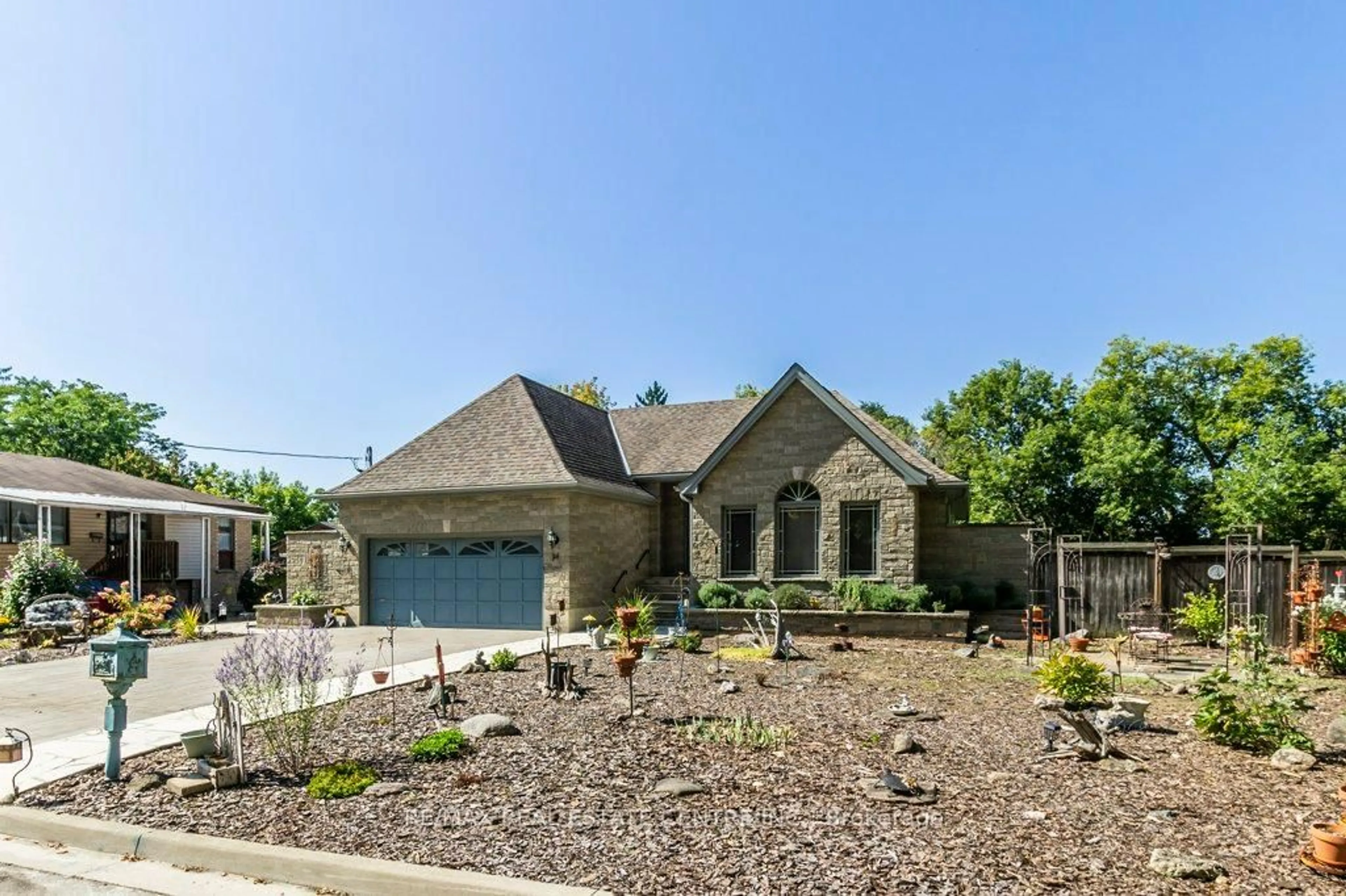 Home with brick exterior material, street for 34 Nimmo St, Brant Ontario N3L 2H9