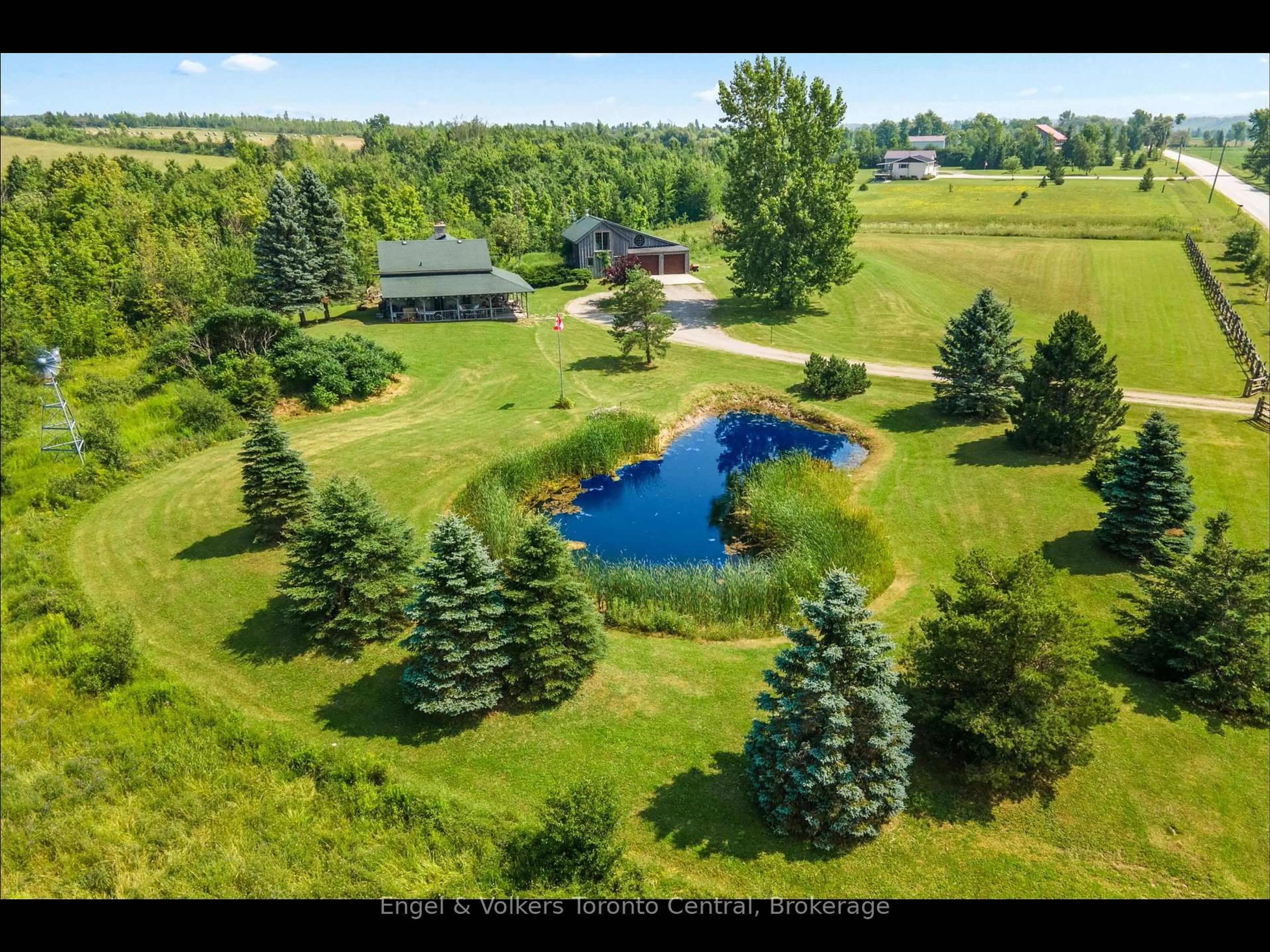 A pic from outside/outdoor area/front of a property/back of a property/a pic from drone, water/lake/river/ocean view for 317343 3rd Line, Meaford Ontario N4L 1W7