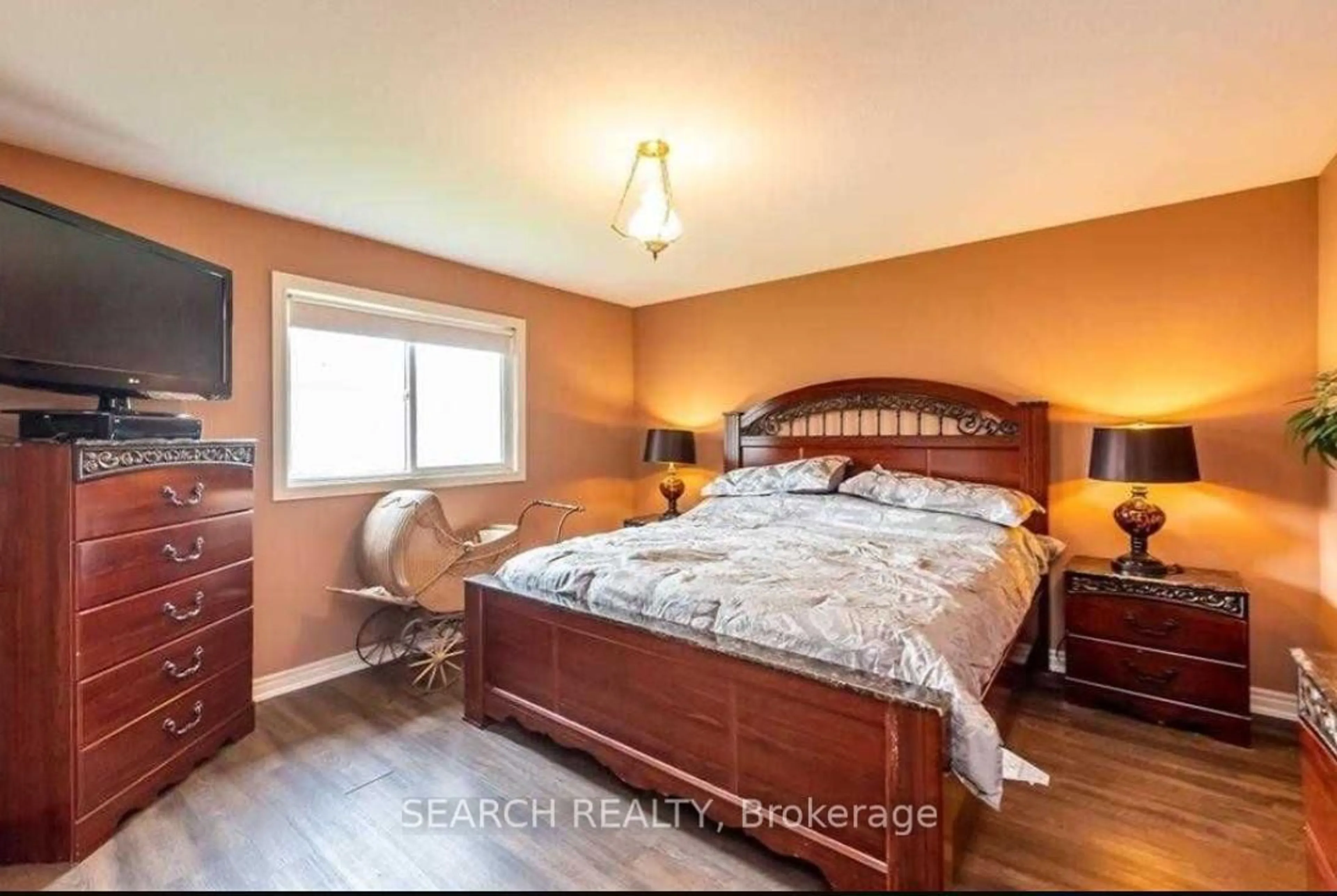 Bedroom with bed, wood/laminate floor for 1211 Tamarac St, Haldimand Ontario N1A 3G6