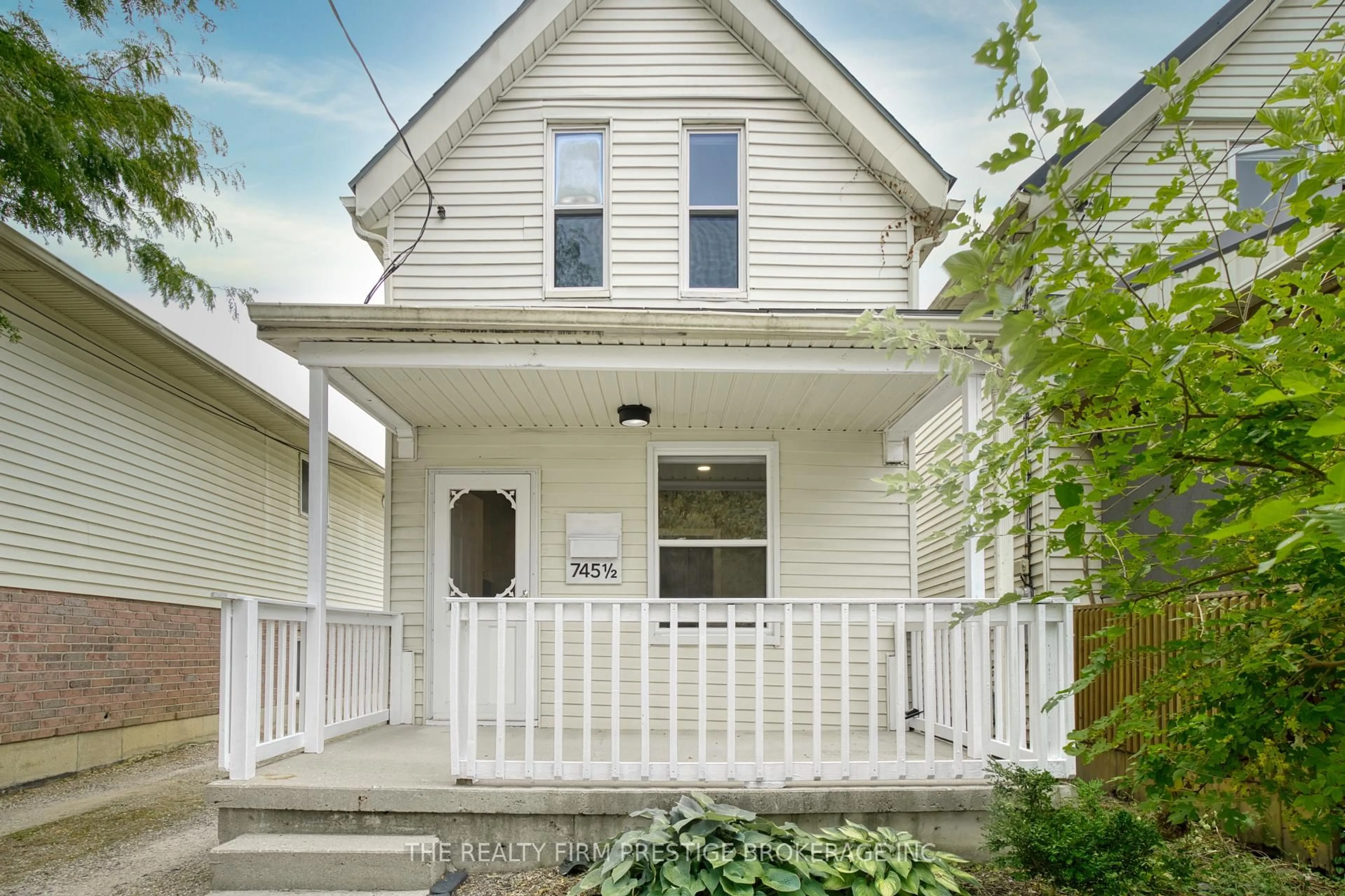 Home with vinyl exterior material, street for 745 1/2 Little Grey St, London East Ontario N5Z 1P2