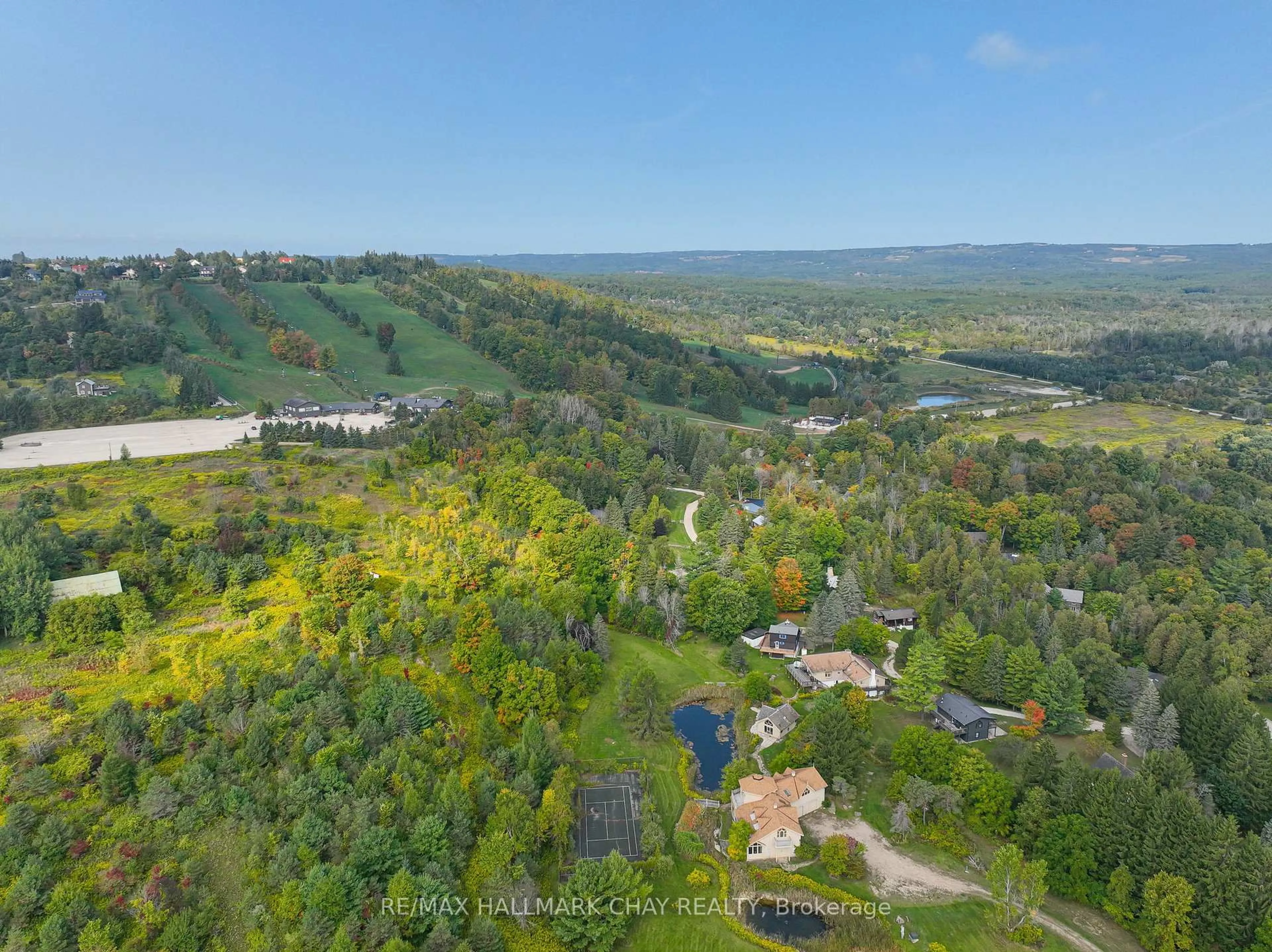 A pic from outside/outdoor area/front of a property/back of a property/a pic from drone, water/lake/river/ocean view for 61 Pine River Cres, Mulmur Ontario L9V 3H3