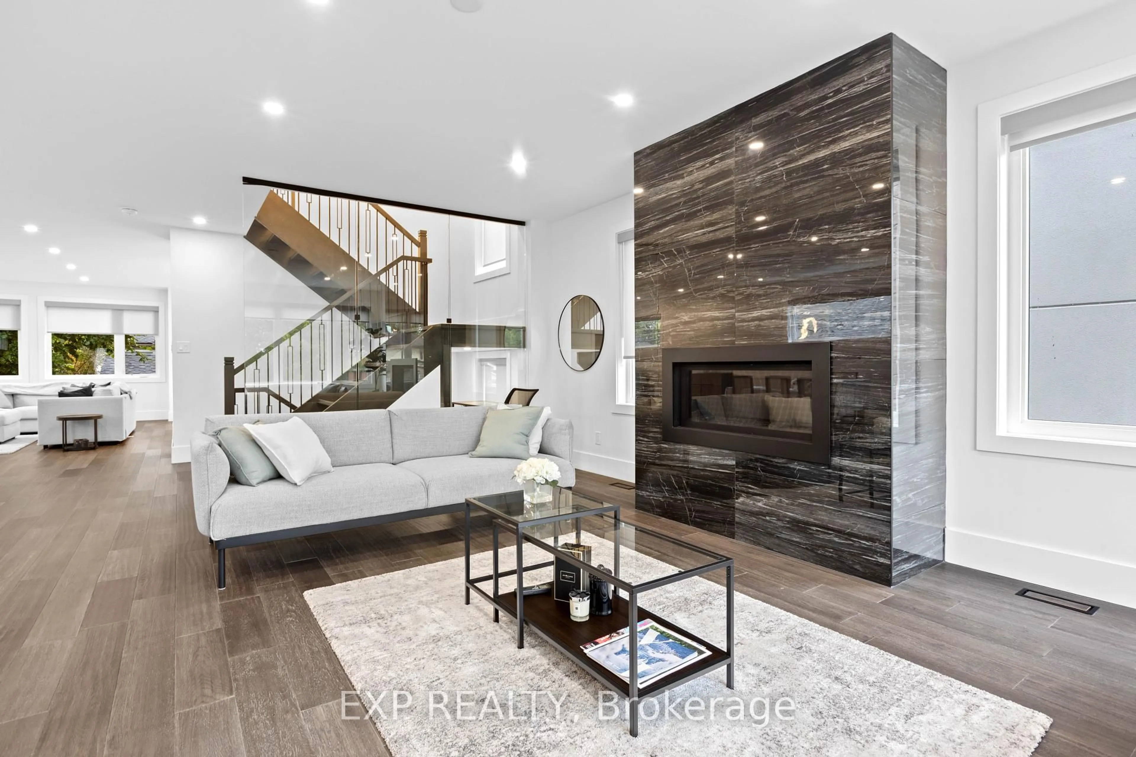 Living room with furniture, wood/laminate floor for 485 Hartleigh Ave, Ottawa Ontario K2B 5J5