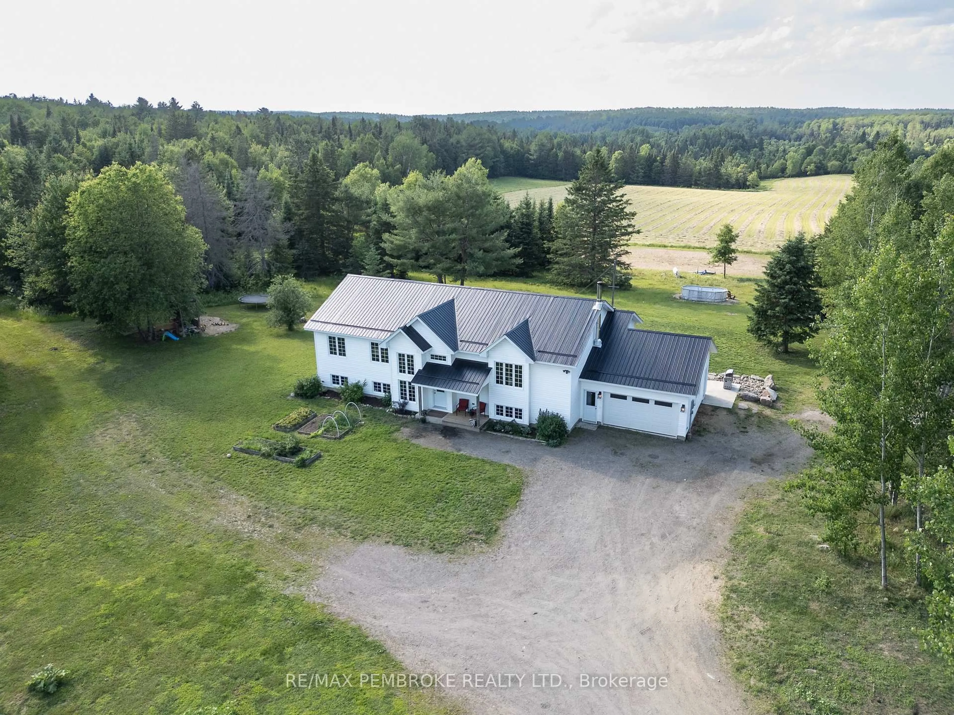 A pic from outside/outdoor area/front of a property/back of a property/a pic from drone, building for 1870 SANDY BEACH Rd, Pembroke Ontario K8A 6W8