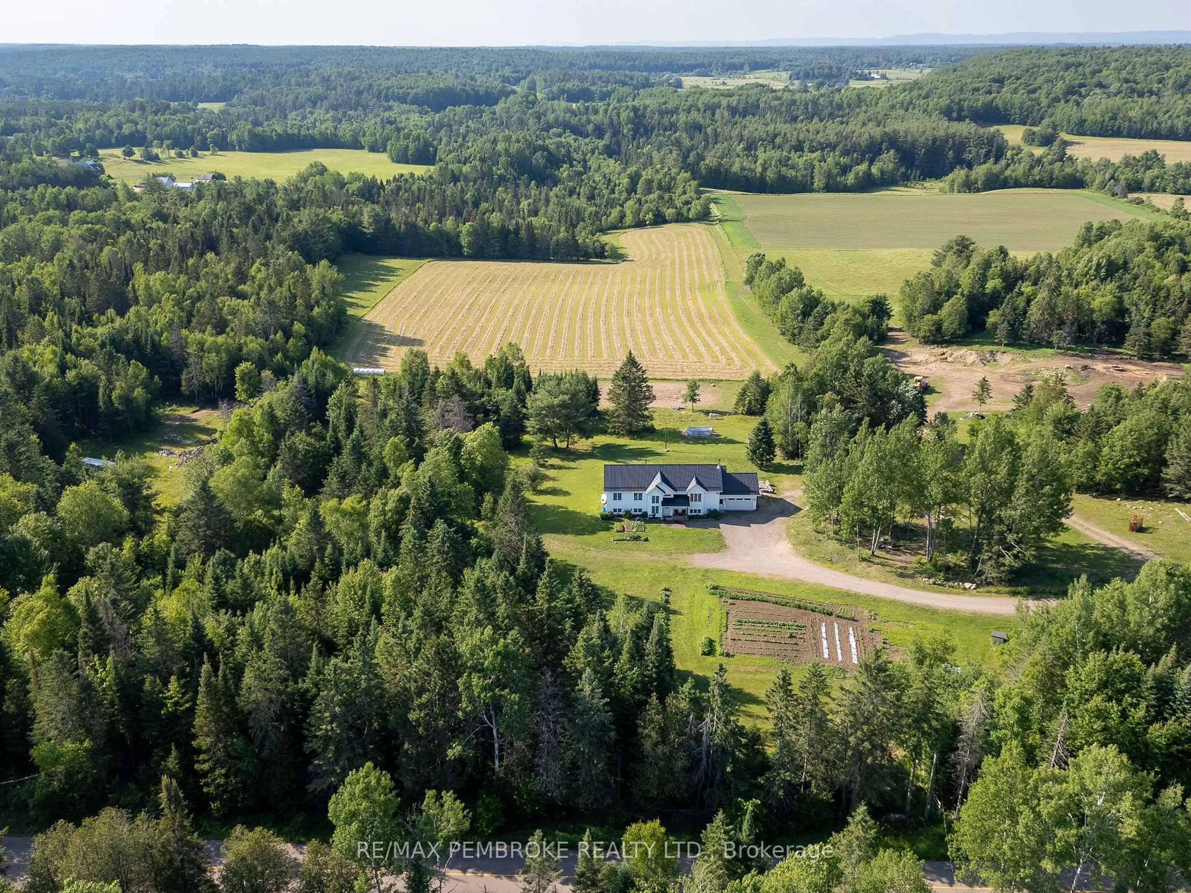 A pic from outside/outdoor area/front of a property/back of a property/a pic from drone, forest/trees view for 1870 SANDY BEACH Rd, Pembroke Ontario K8A 6W8