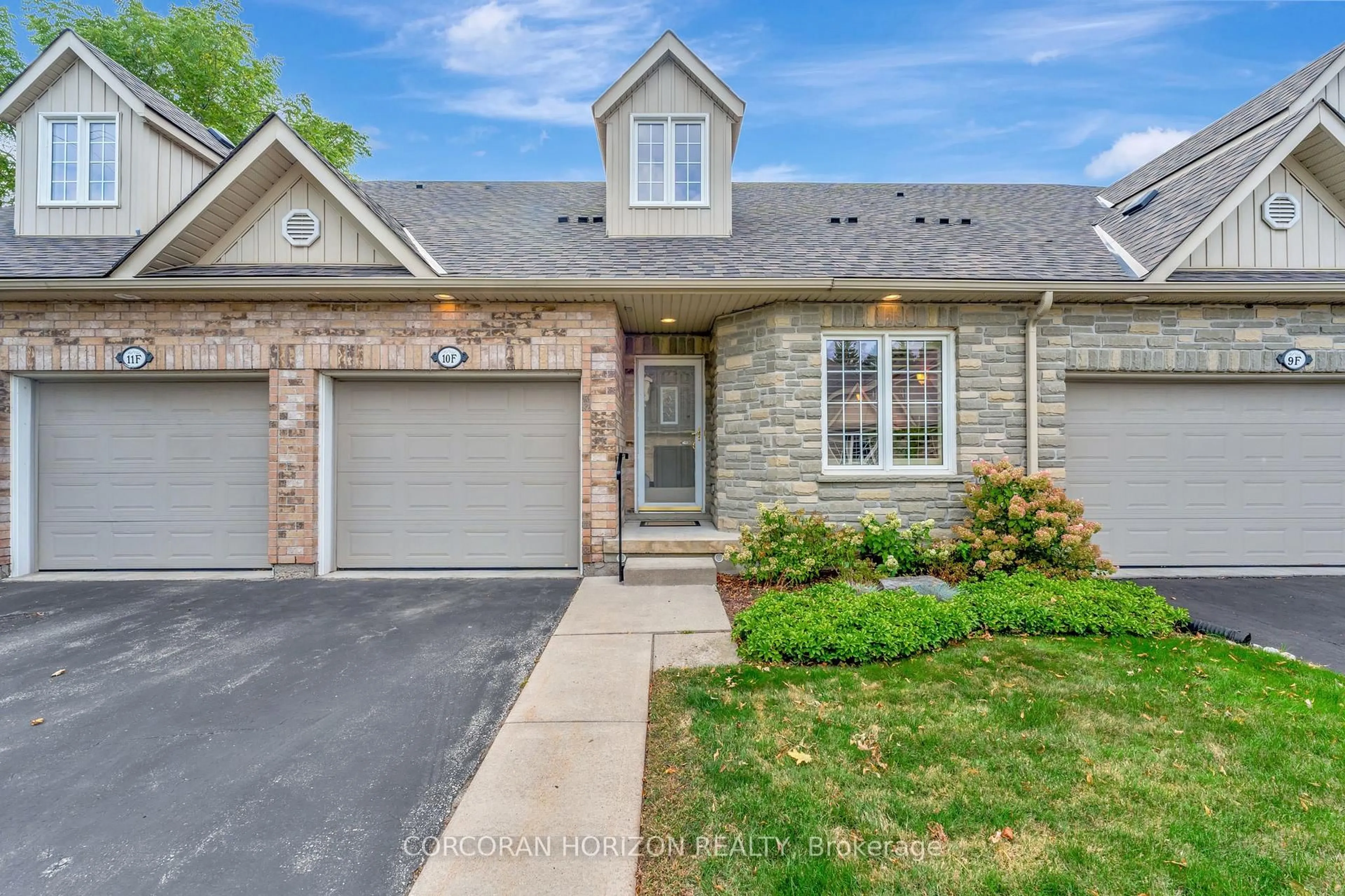 Home with brick exterior material, street for 350 Doon Valley Dr #10F, Kitchener Ontario N2P 2M9