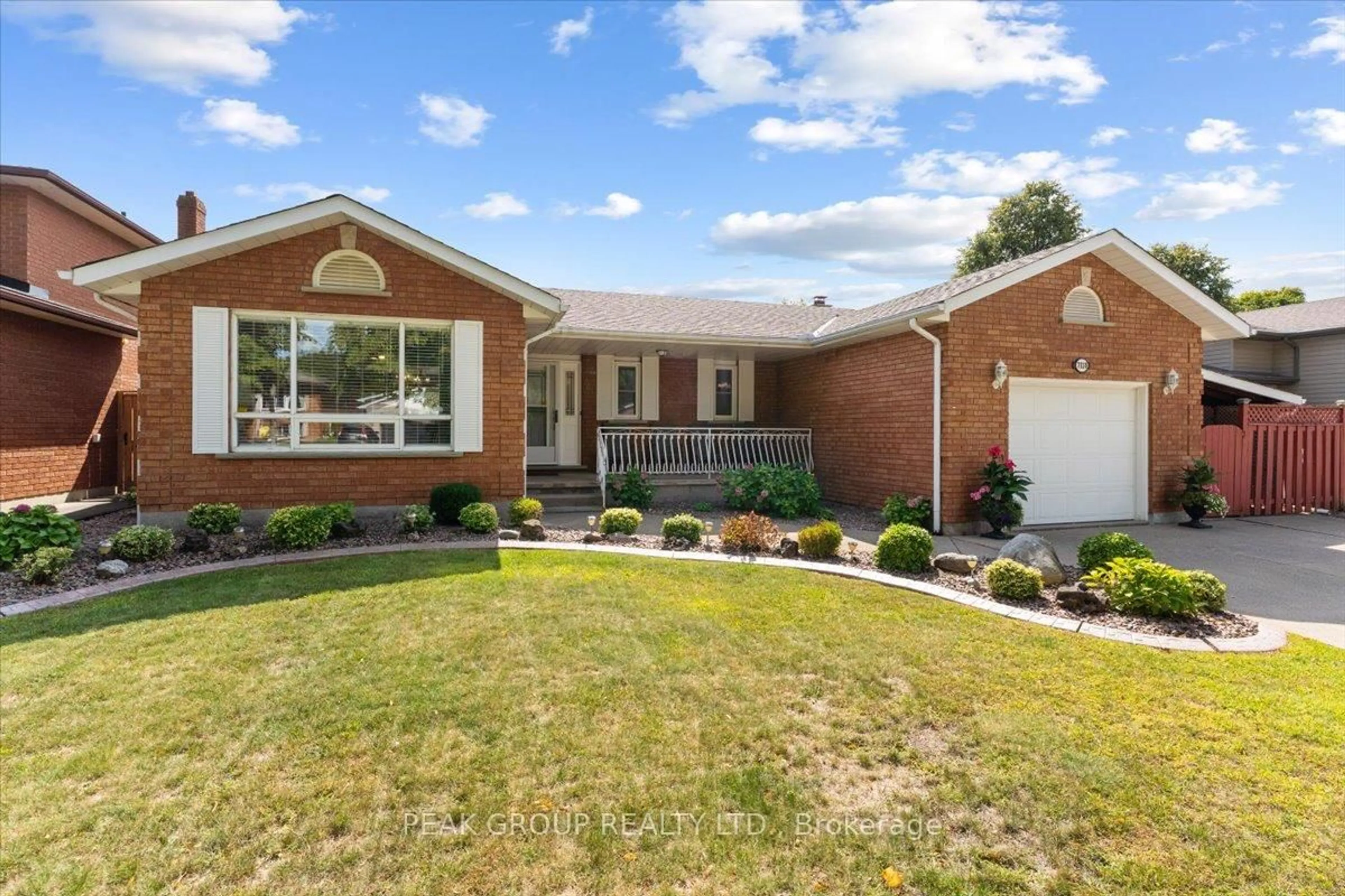 Home with brick exterior material, street for 7110 Harovics Lane, Niagara Falls Ontario L2G 7S9