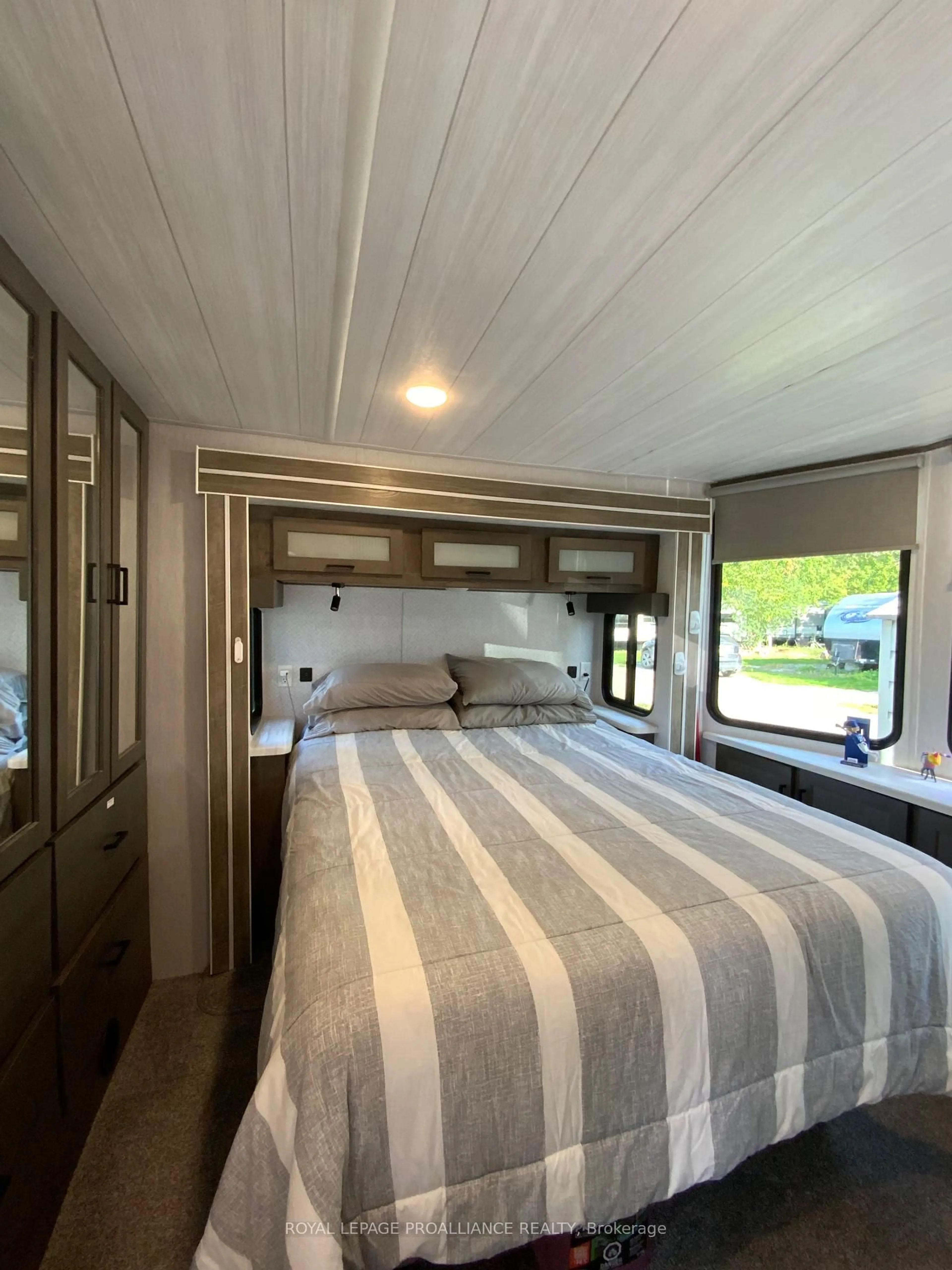 Bedroom with bed, wood/laminate floor for 9 Island Park, Hastings Ontario K0K 2C0