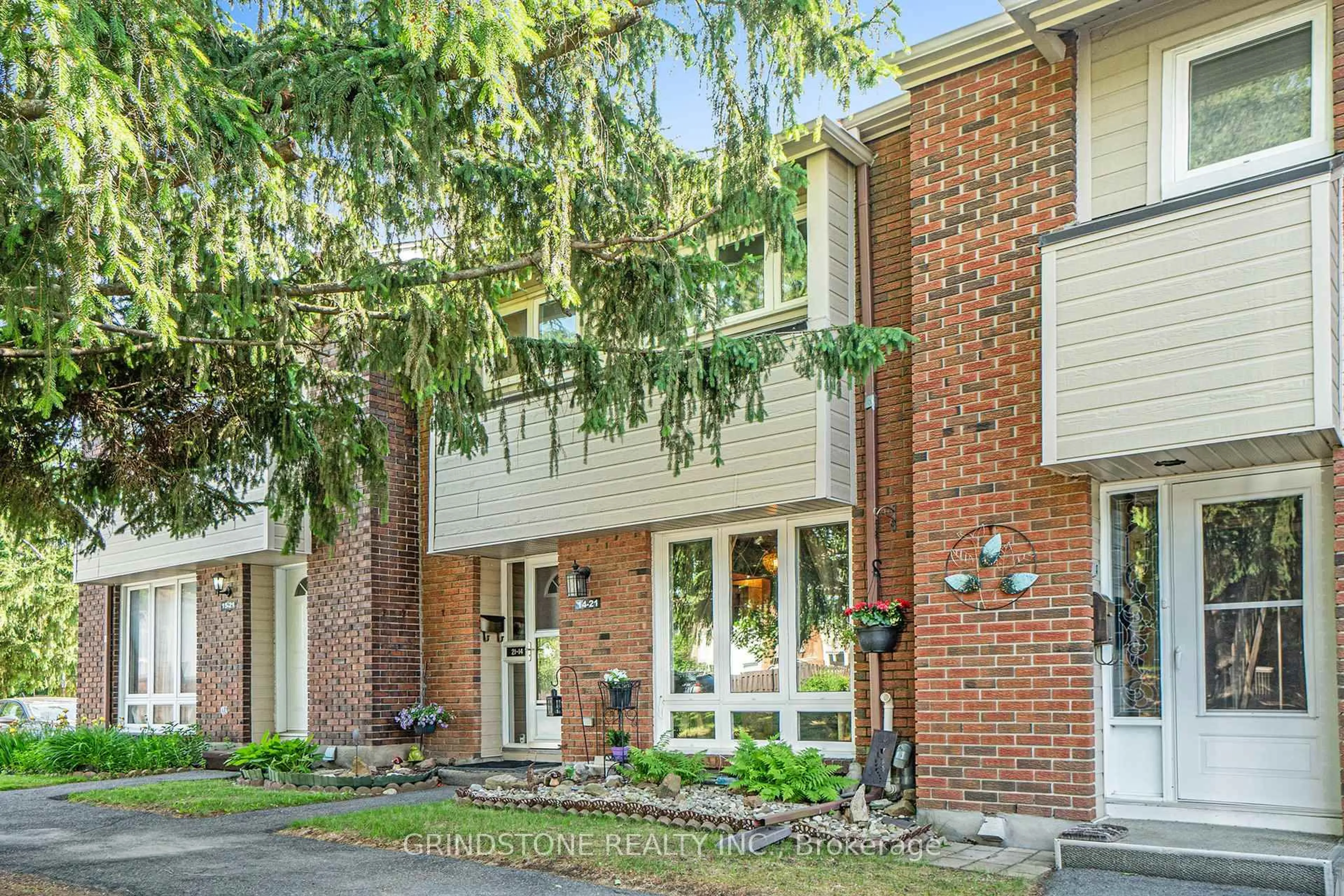 Home with brick exterior material, street for 21 Midland Cres #14, Ottawa Ontario K2H 8P6
