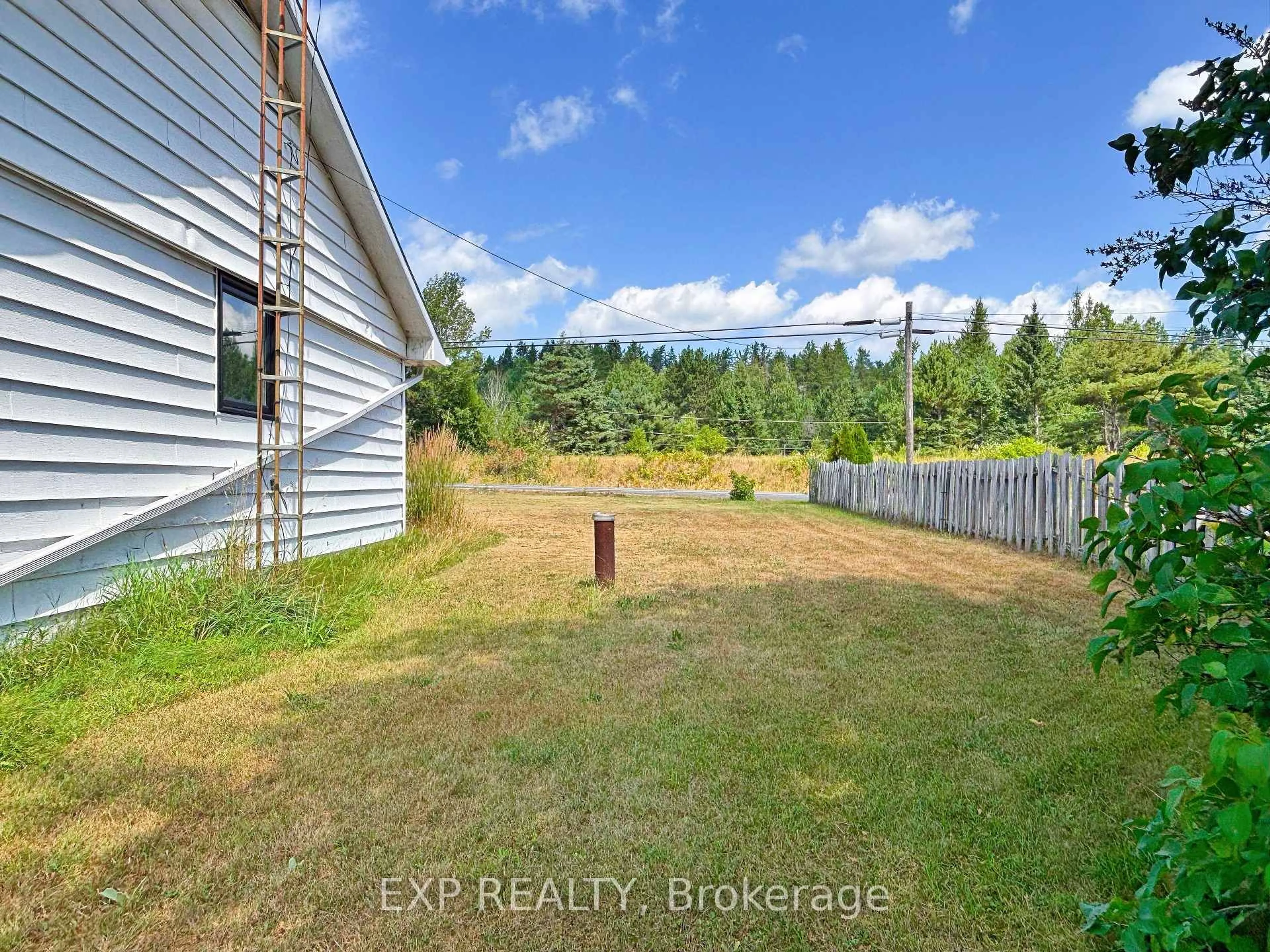 A pic from outside/outdoor area/front of a property/back of a property/a pic from drone, water/lake/river/ocean view for 17851 Highway 60 Highway, Wilno Ontario K0J 2N0