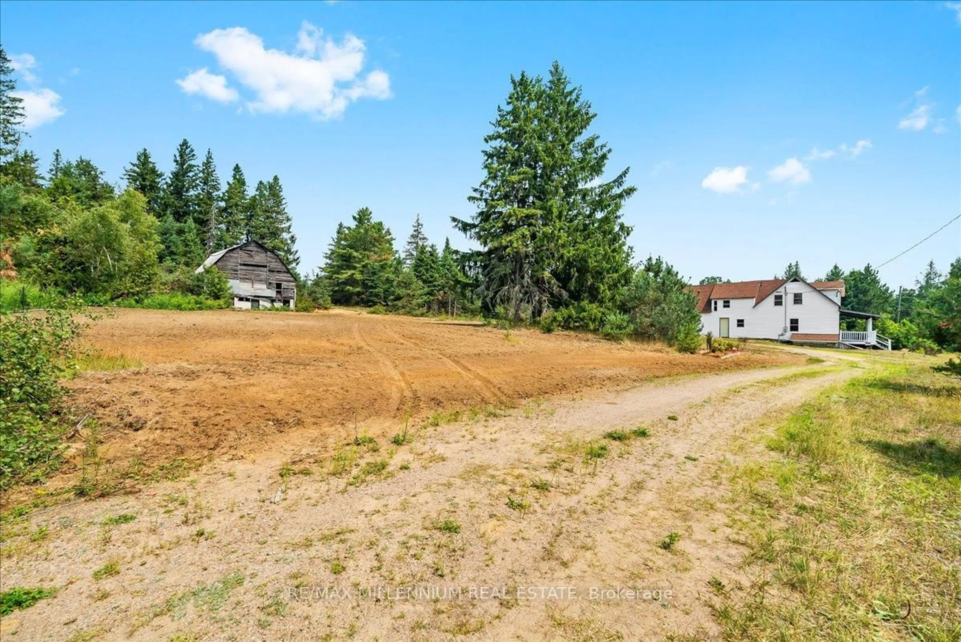 A pic from outside/outdoor area/front of a property/back of a property/a pic from drone, unknown for 3529 Highway Highway #118, Bracebridge Ontario P1L 1X1