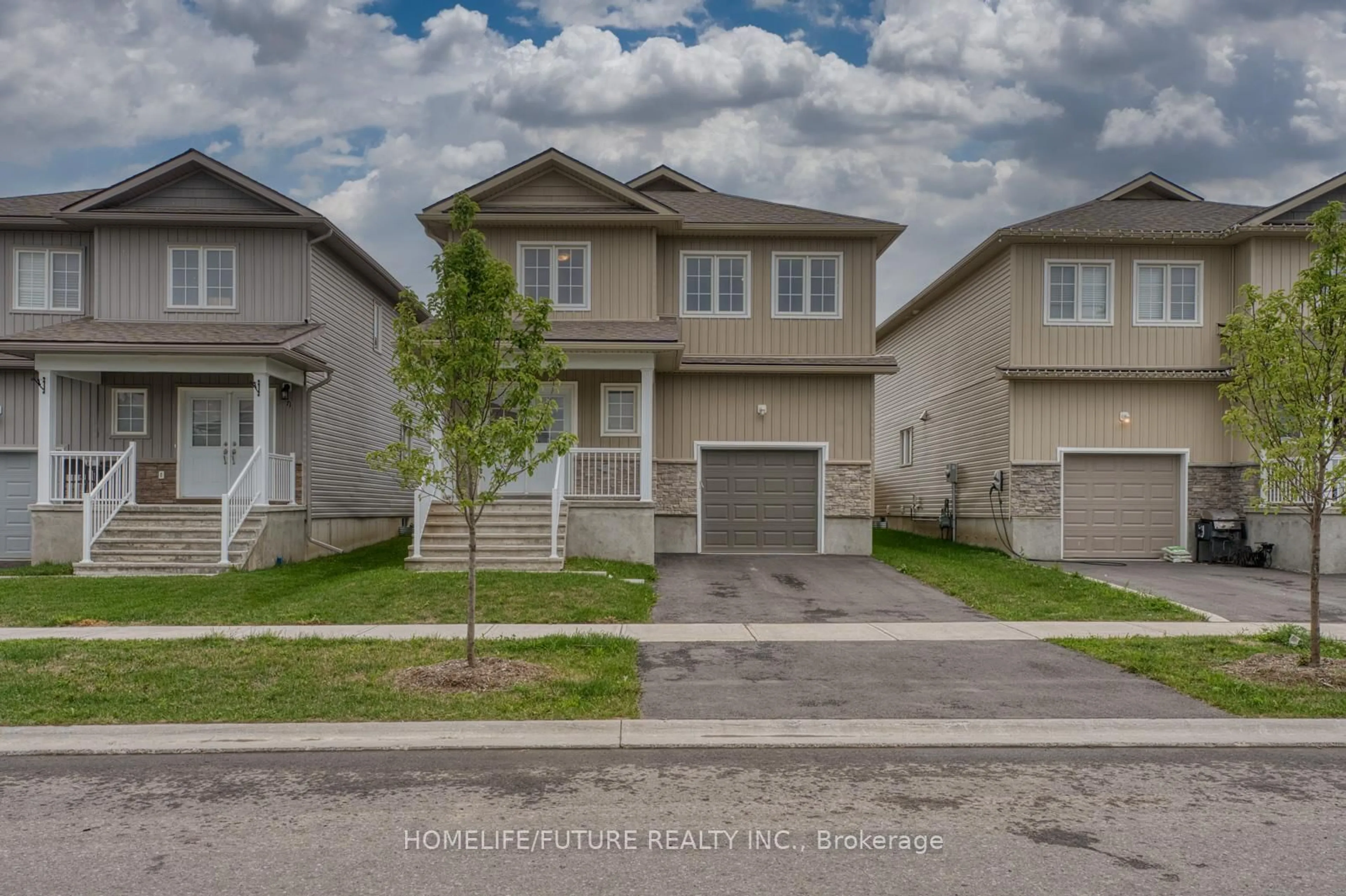 A pic from outside/outdoor area/front of a property/back of a property/a pic from drone, street for 69 Brennan Cres, Bissett Creek Ontario K0H 2H0