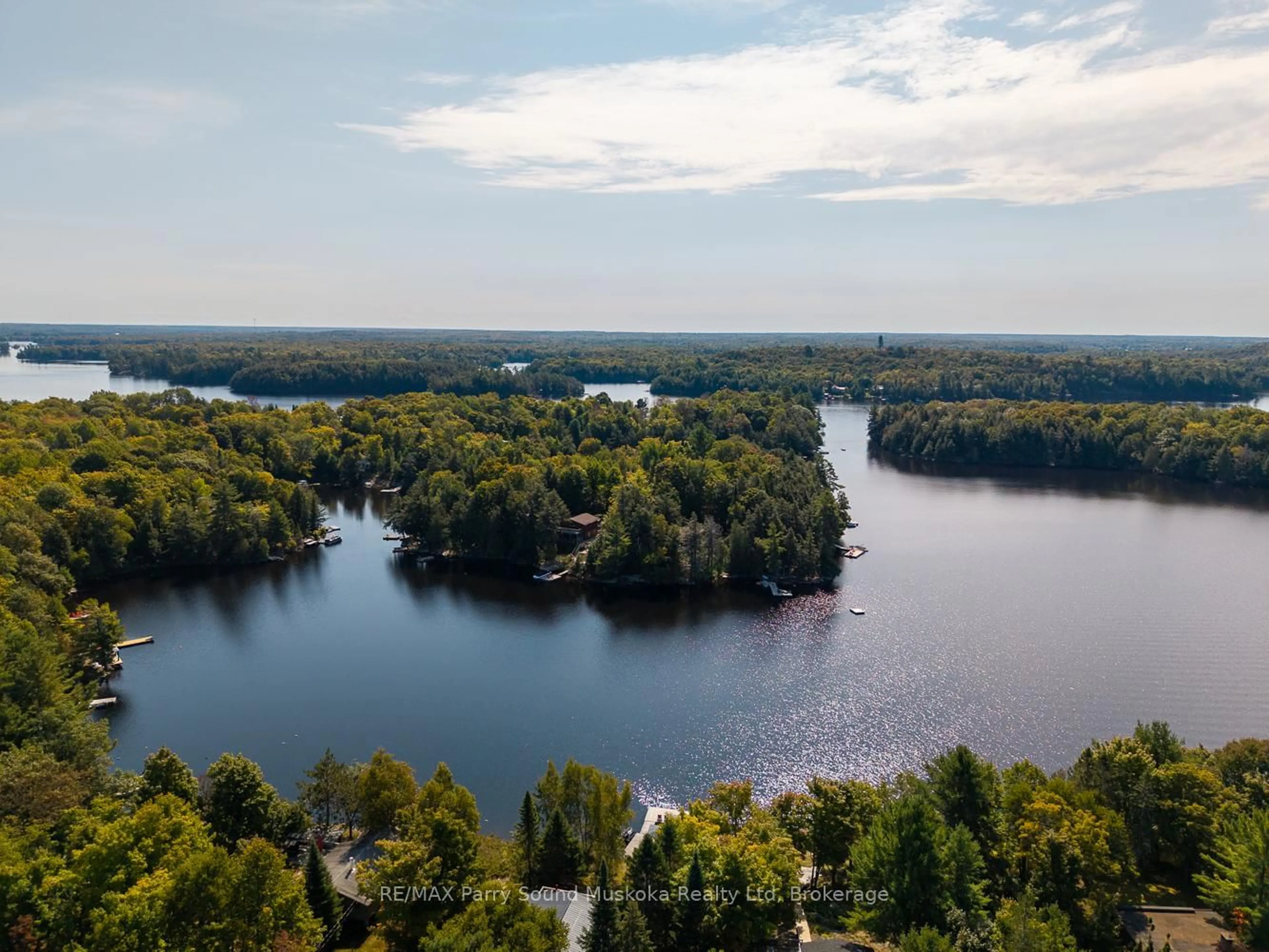 A pic from outside/outdoor area/front of a property/back of a property/a pic from drone, water/lake/river/ocean view for 8 Marine Dr, McKellar Ontario P2A 0B4