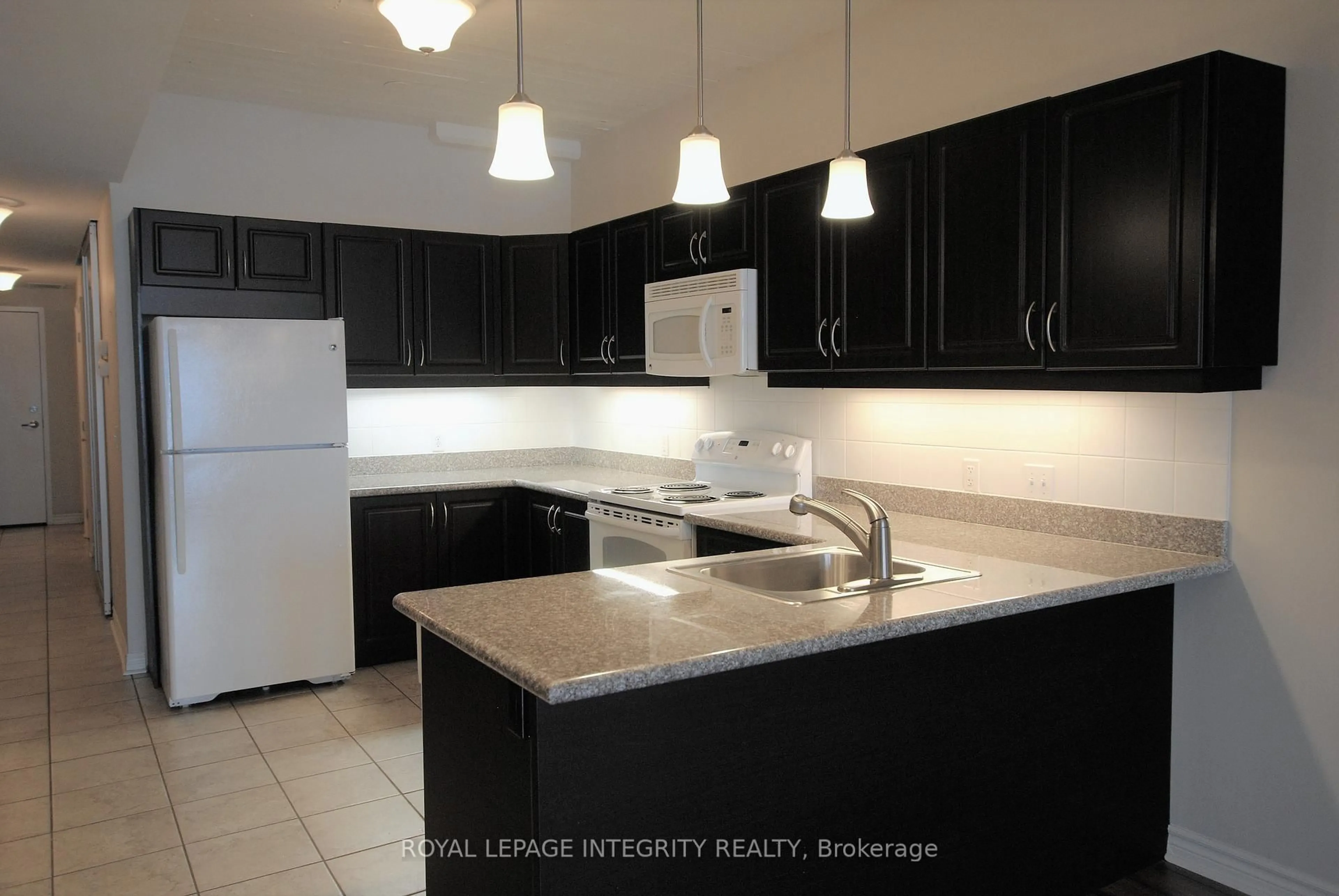 Standard kitchen, ceramic/tile floor for 710 Cotton Mill St #306, Cornwall Ontario K6H 7L3