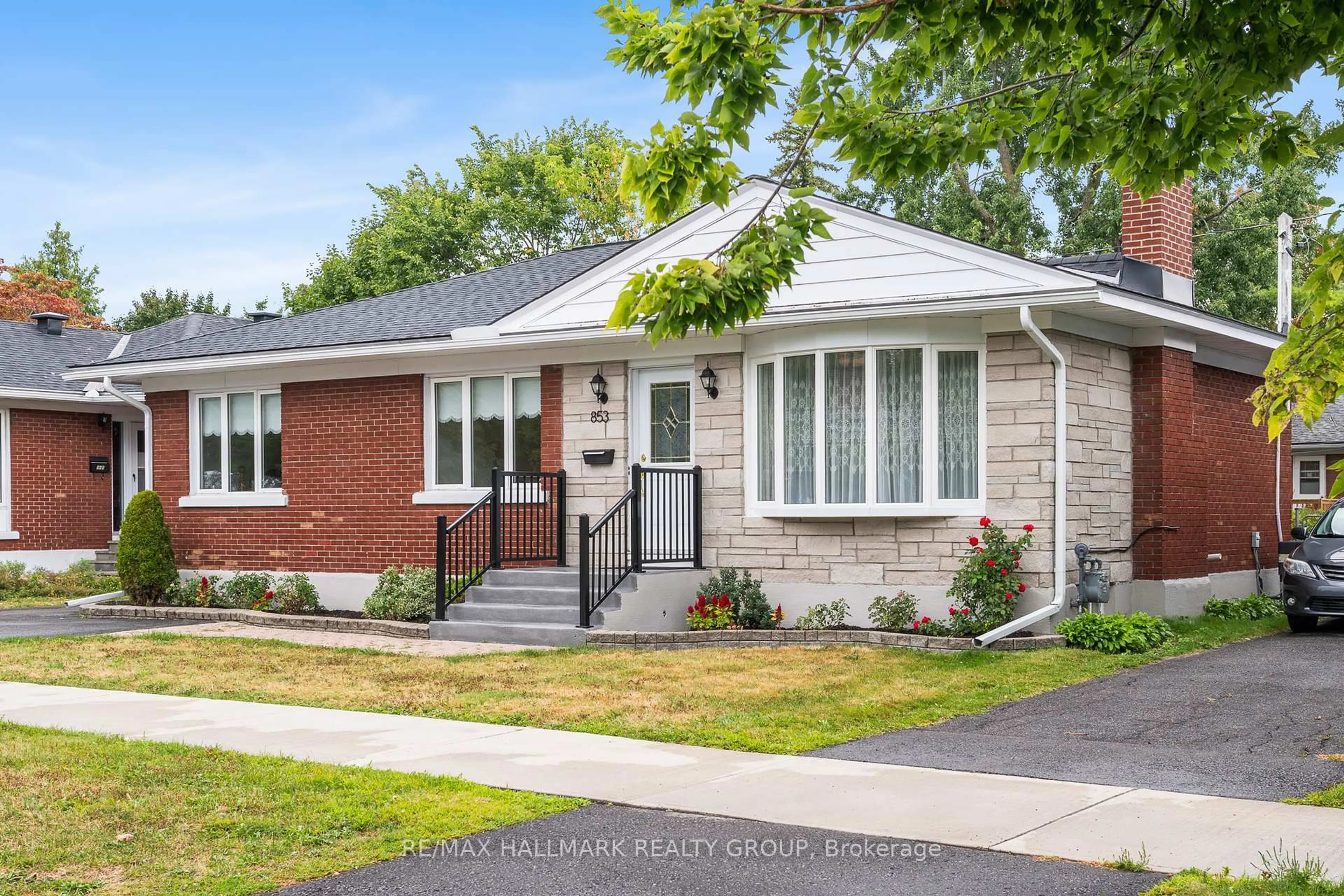 Home with brick exterior material, street for 853 CHAPMAN Blvd, Ottawa Ontario K1G 1V1