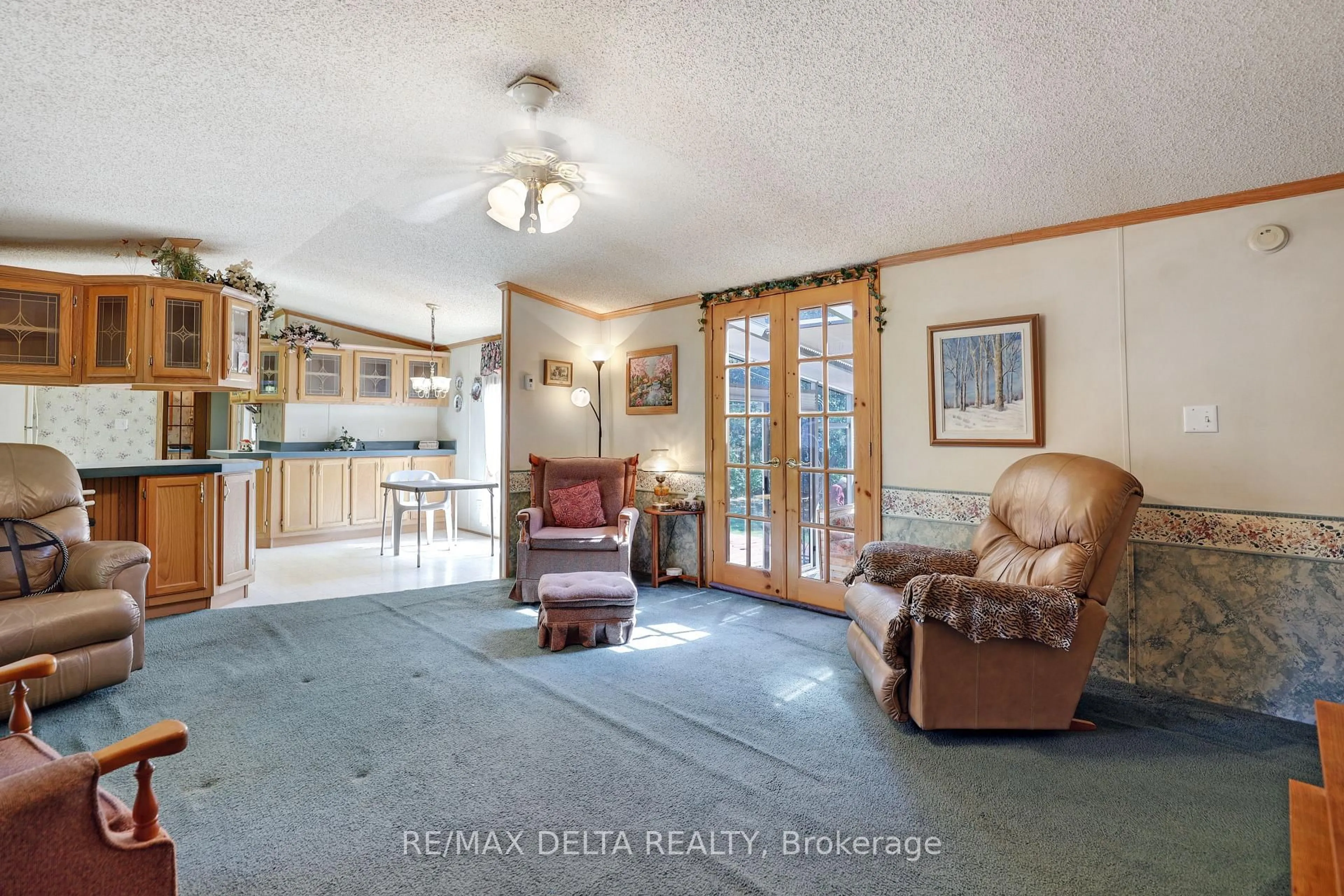 Living room with furniture, ceramic/tile floor for 15270 Concession 8-9 Rd, North Stormont Ontario K0A 1R0