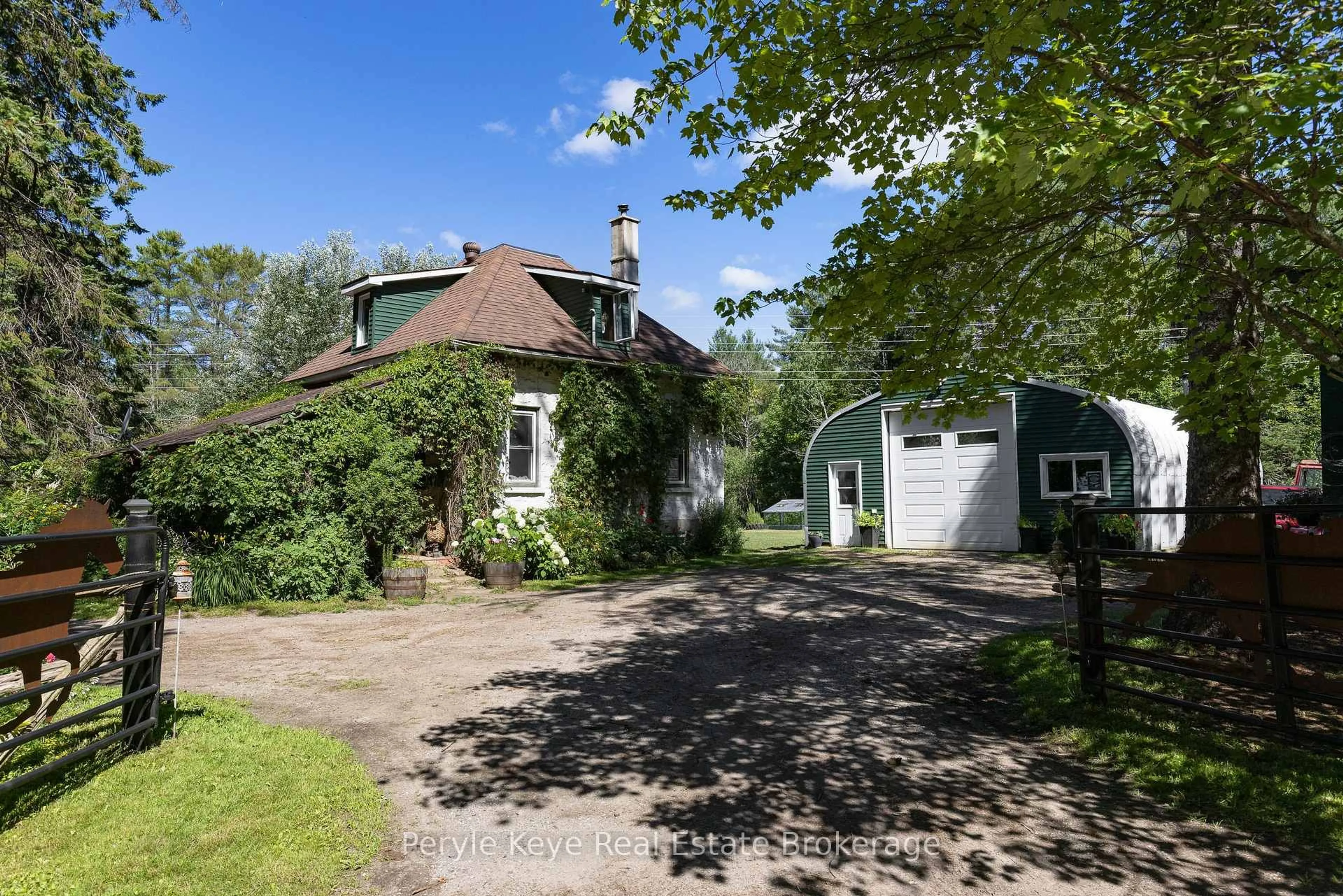 A pic from outside/outdoor area/front of a property/back of a property/a pic from drone, street for 2322 Old Muskoka Rd, Huntsville Ontario P0B 1M0