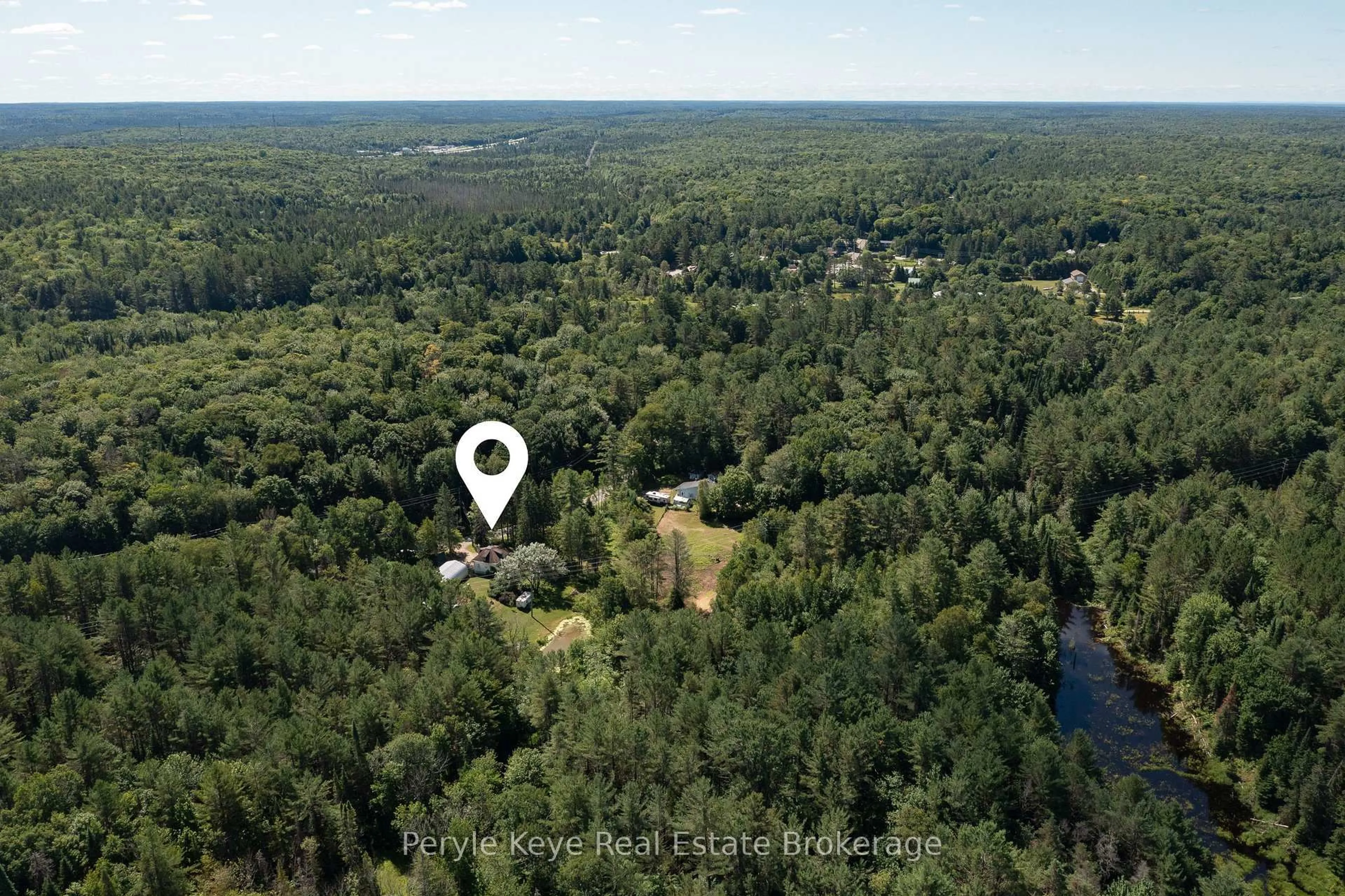 A pic from outside/outdoor area/front of a property/back of a property/a pic from drone, forest/trees view for 2322 Old Muskoka Rd, Huntsville Ontario P0B 1M0