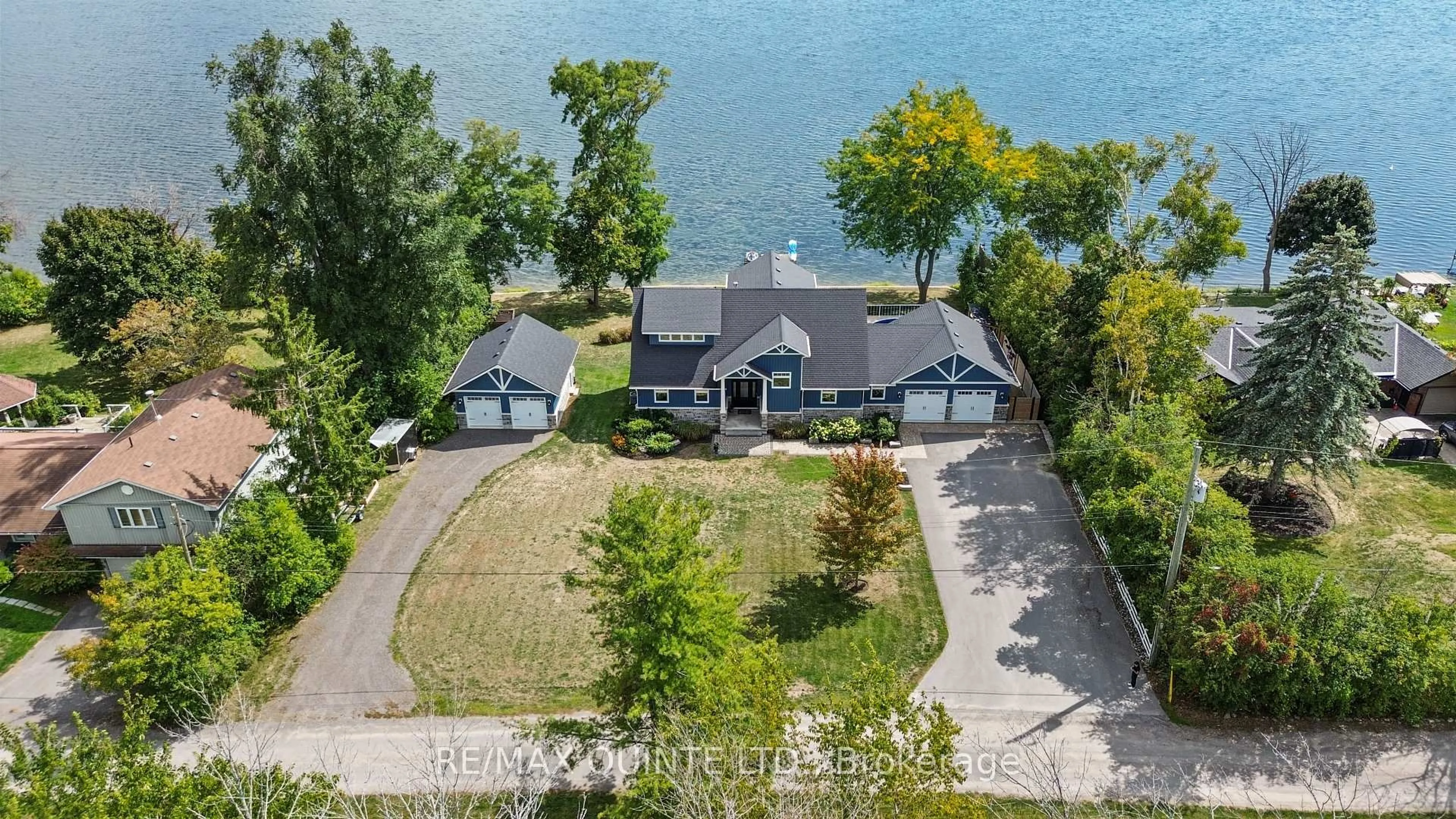 A pic from outside/outdoor area/front of a property/back of a property/a pic from drone, water/lake/river/ocean view for 5 Osprey Lane, Trenton Ontario K8V 5P7