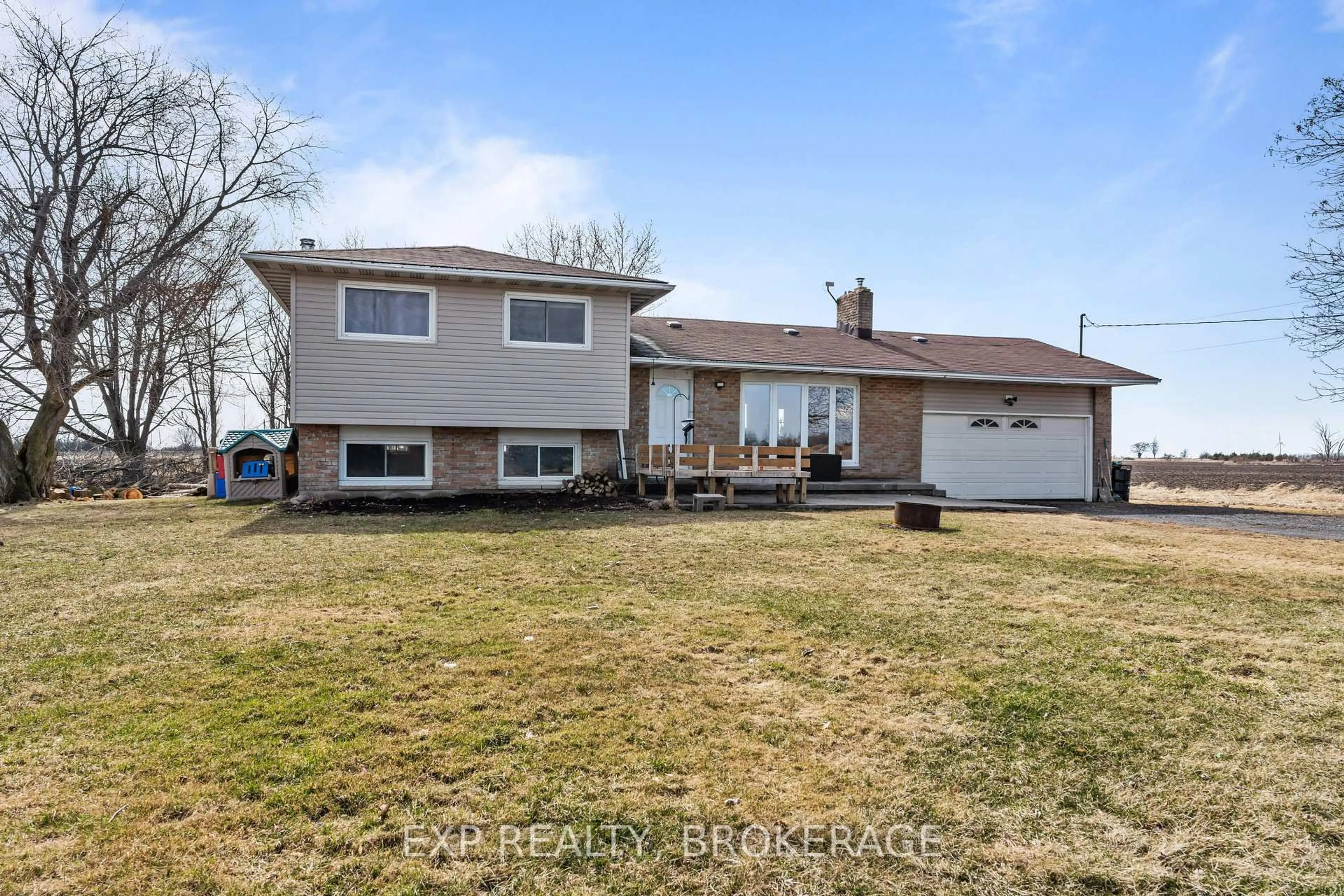 A pic from outside/outdoor area/front of a property/back of a property/a pic from drone, street for 701 HIGHWAY 95, Frontenac Islands Ontario K7M 8W2