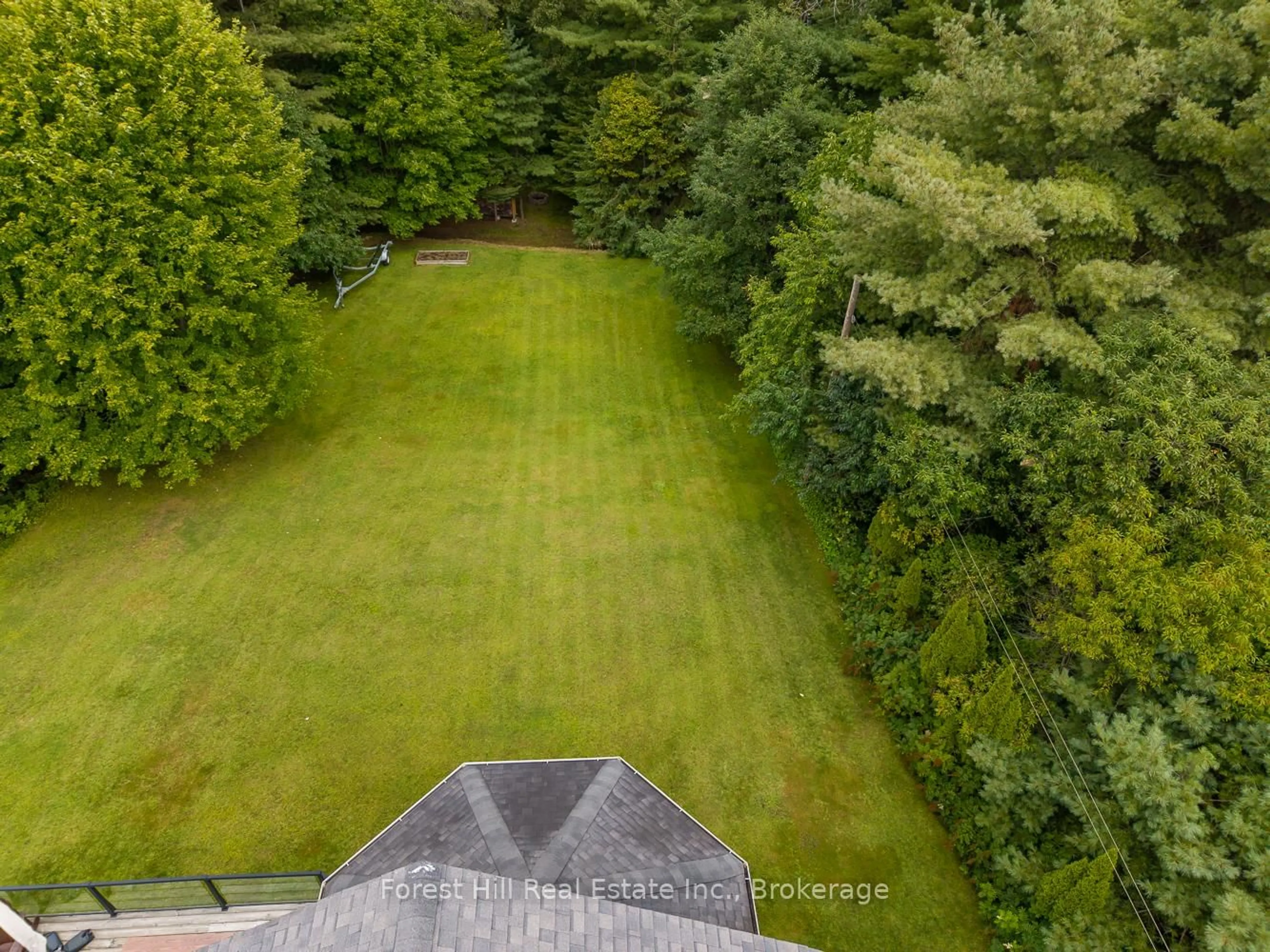 A pic from outside/outdoor area/front of a property/back of a property/a pic from drone, forest/trees view for 37 Parkway Ave, McDougall Ontario P0G 1G0