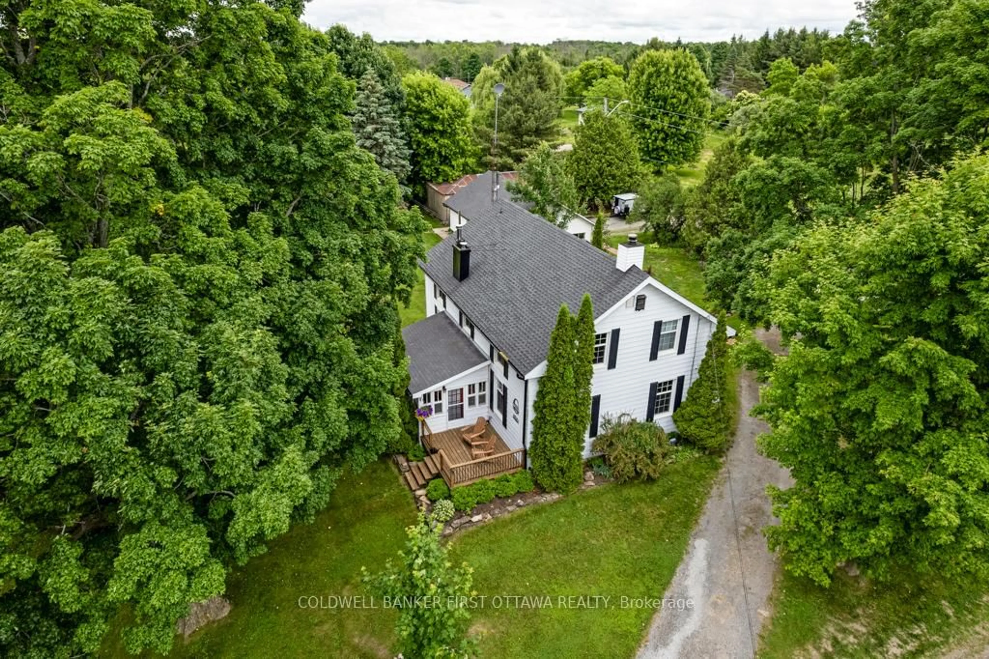 A pic from outside/outdoor area/front of a property/back of a property/a pic from drone, street for 4 Station Rd, Rideau Lakes Ontario K0G 1V0