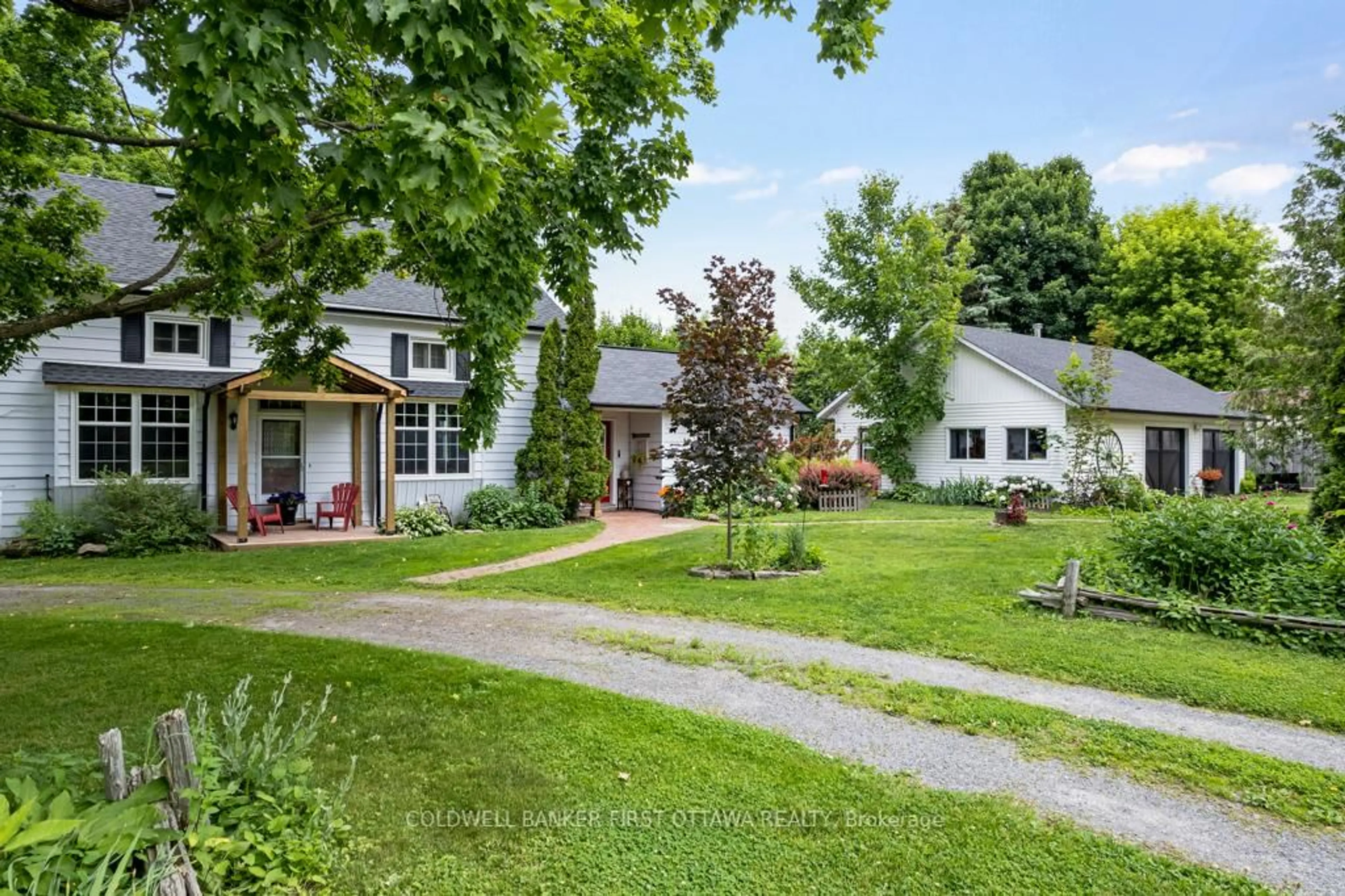 A pic from outside/outdoor area/front of a property/back of a property/a pic from drone, street for 4 Station Rd, Rideau Lakes Ontario K0G 1V0