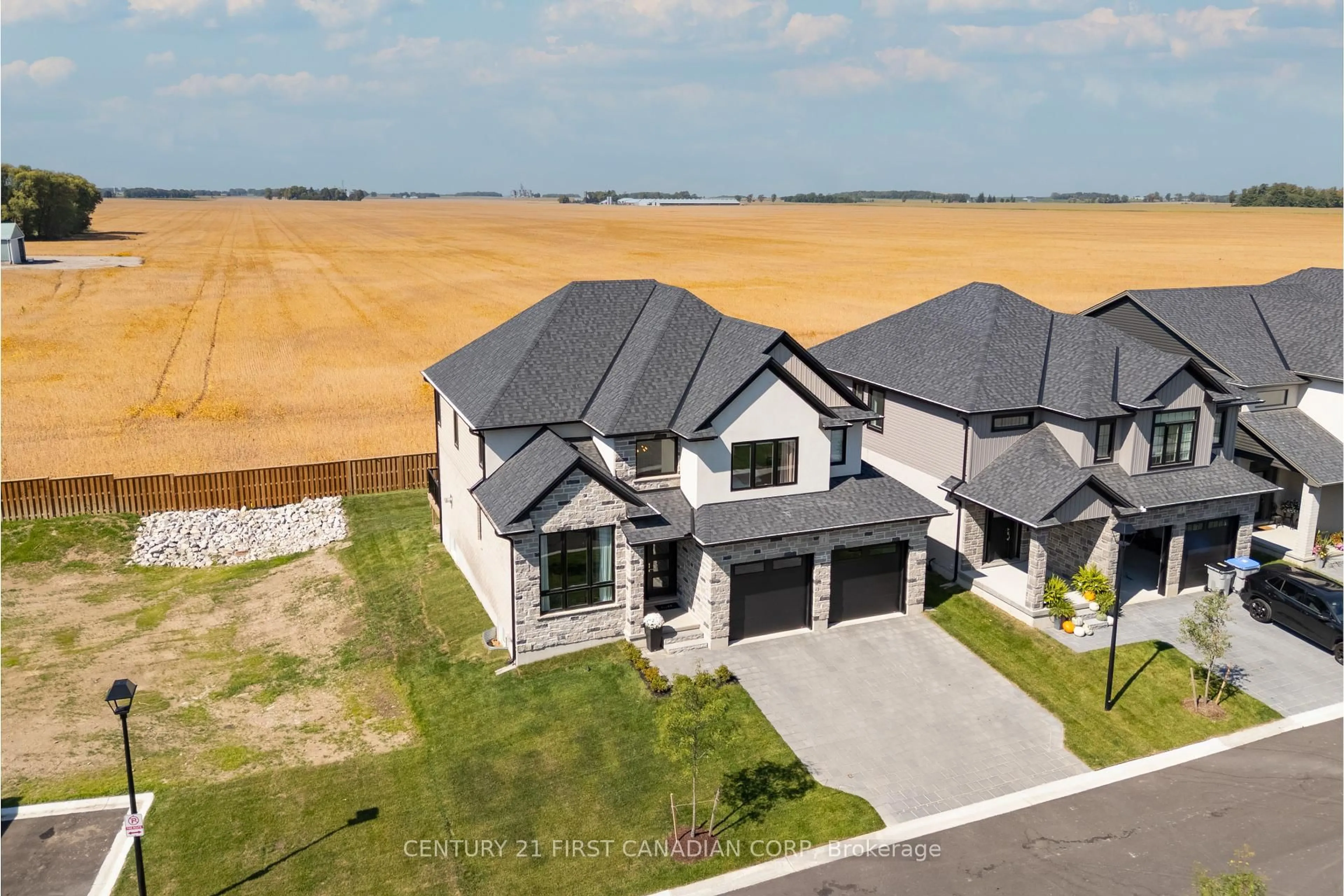 A pic from outside/outdoor area/front of a property/back of a property/a pic from drone, unknown for 7966 Fallon Dr #1, Lucan Biddulph Ontario N0M 1V0
