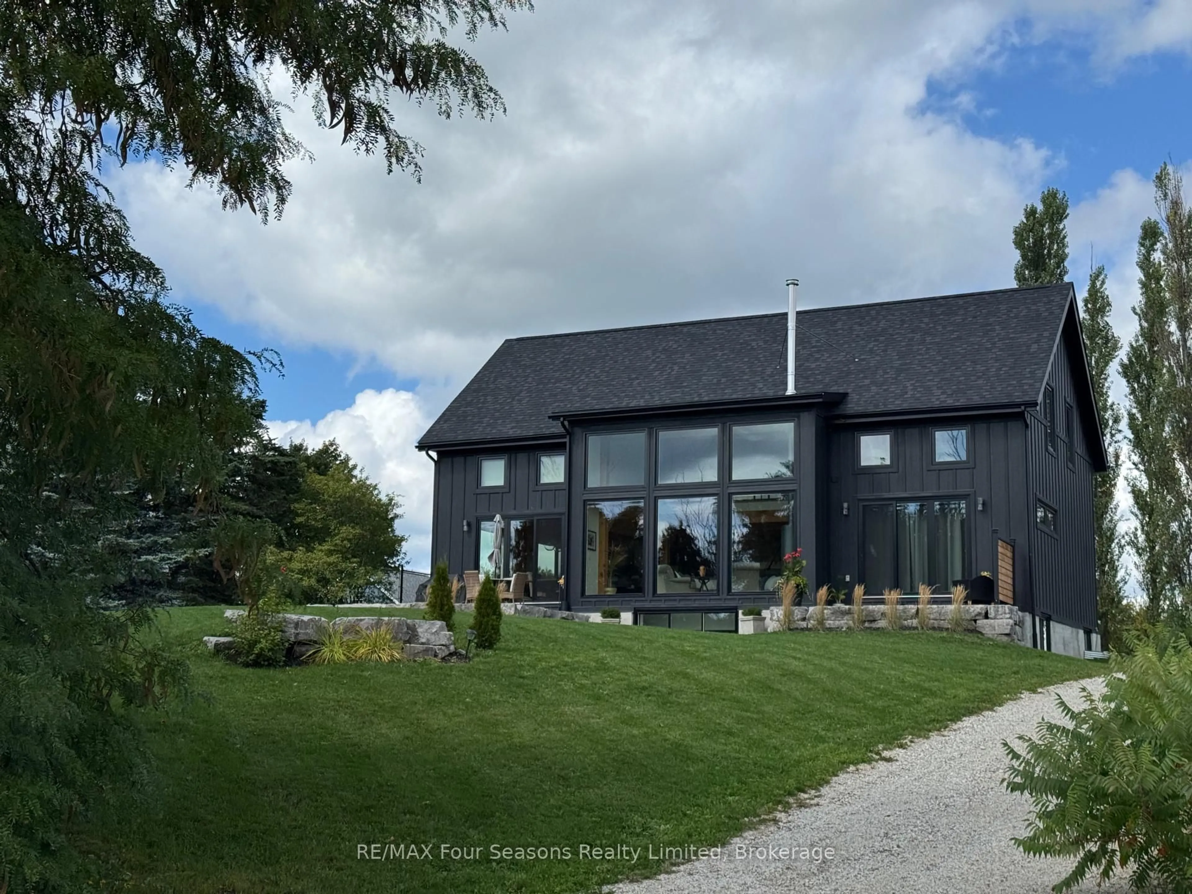 A pic from outside/outdoor area/front of a property/back of a property/a pic from drone, mountain view for 113 Slabtown Rd, Blue Mountains Ontario N0H 1J0