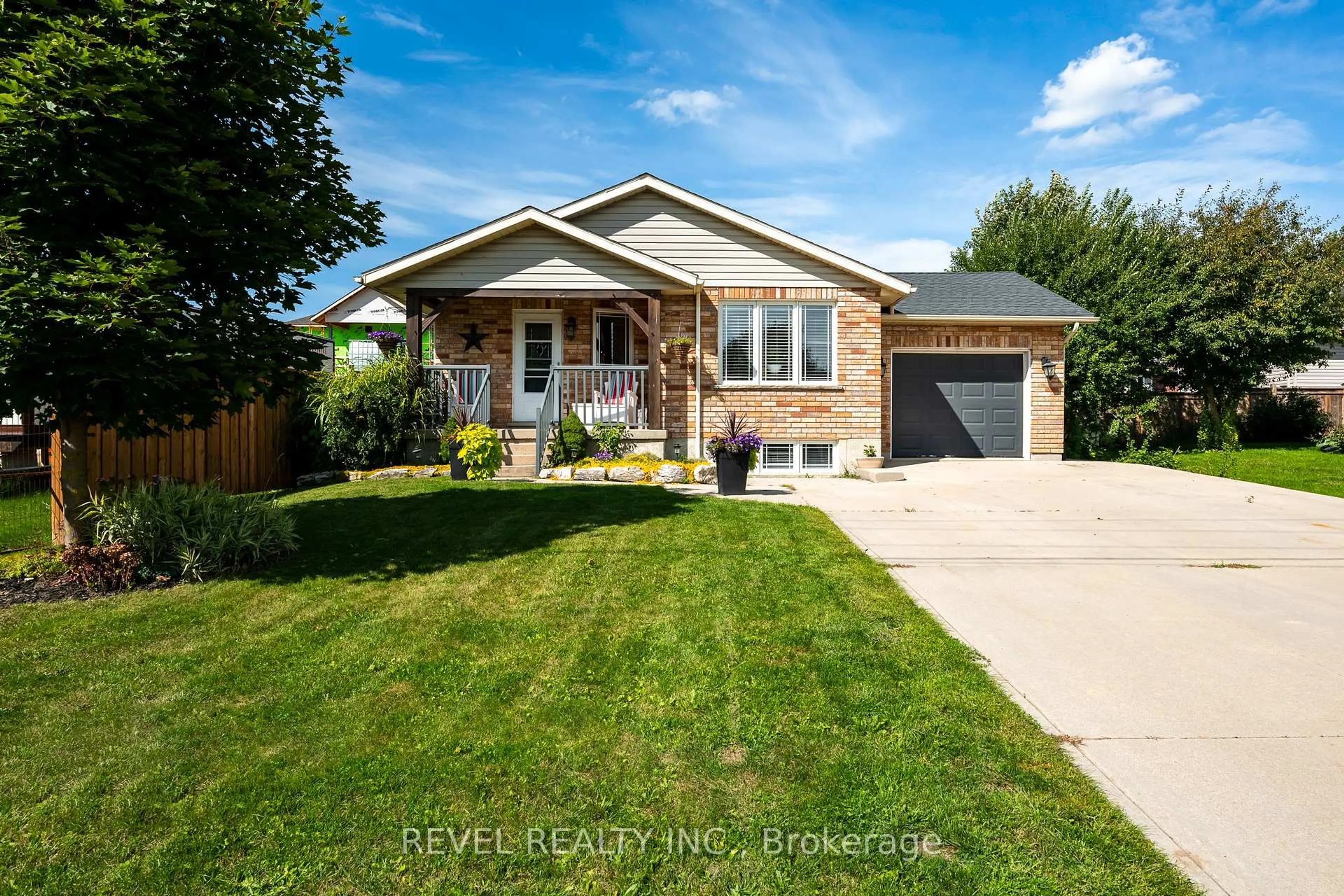 Home with vinyl exterior material, street for 771 Princess St, Wellington North Ontario N0G 2L3