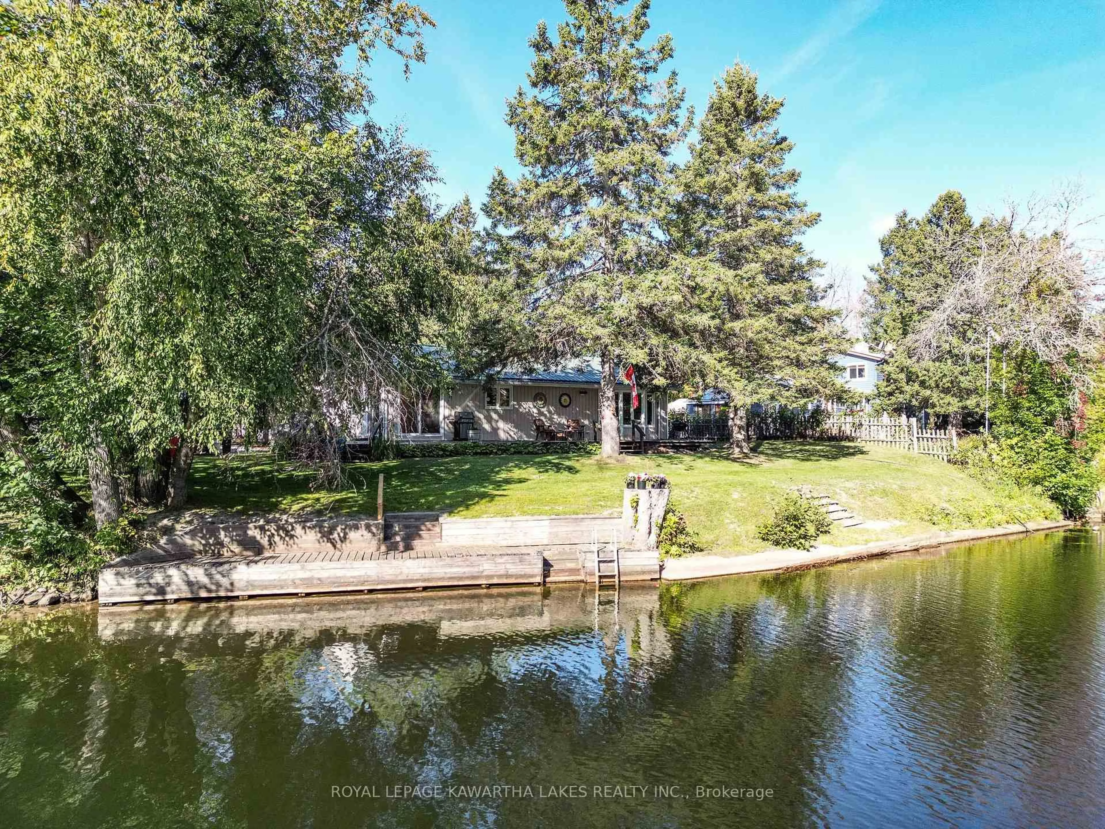 A pic from outside/outdoor area/front of a property/back of a property/a pic from drone, water/lake/river/ocean view for 78 Riverbank Rd, Kawartha Lakes Ontario K0M 1N0