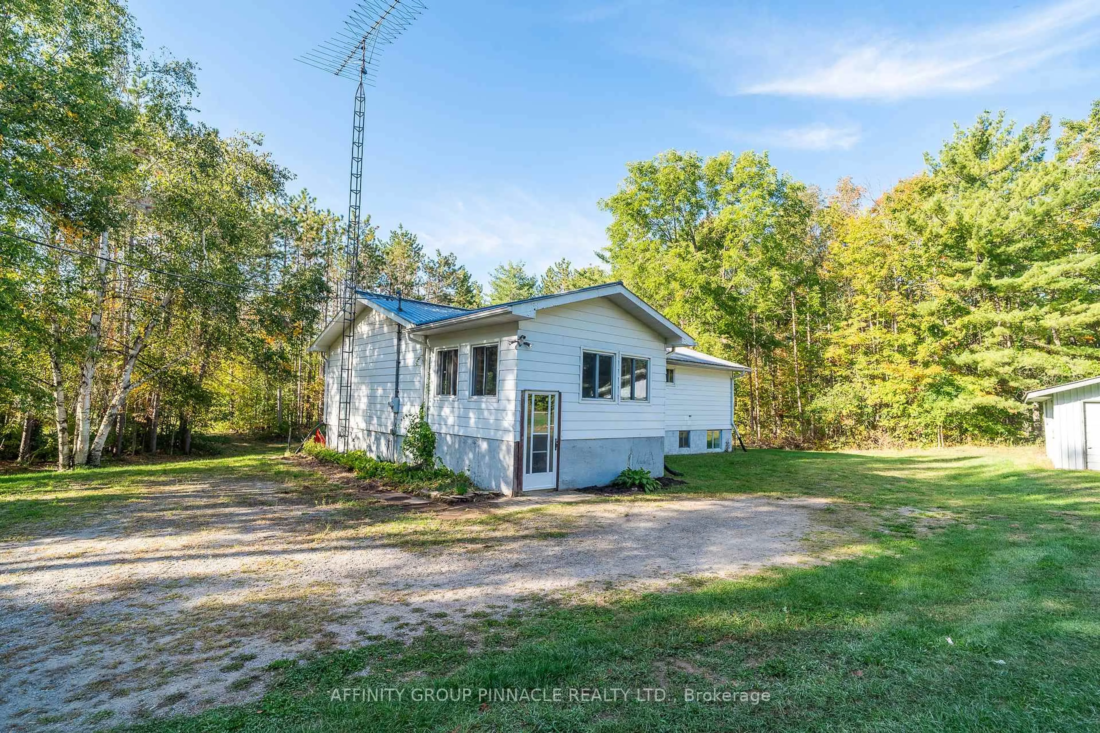 A pic from outside/outdoor area/front of a property/back of a property/a pic from drone, unknown for 16 Sticky Lane, Kawartha Lakes Ontario K0M 1K0